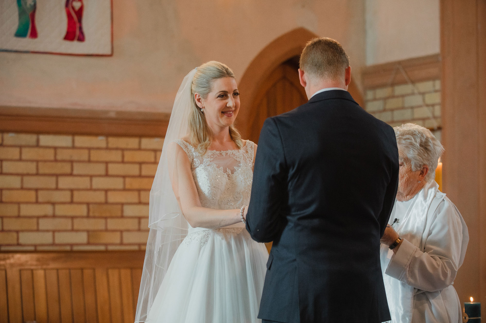 bride looking at the groom