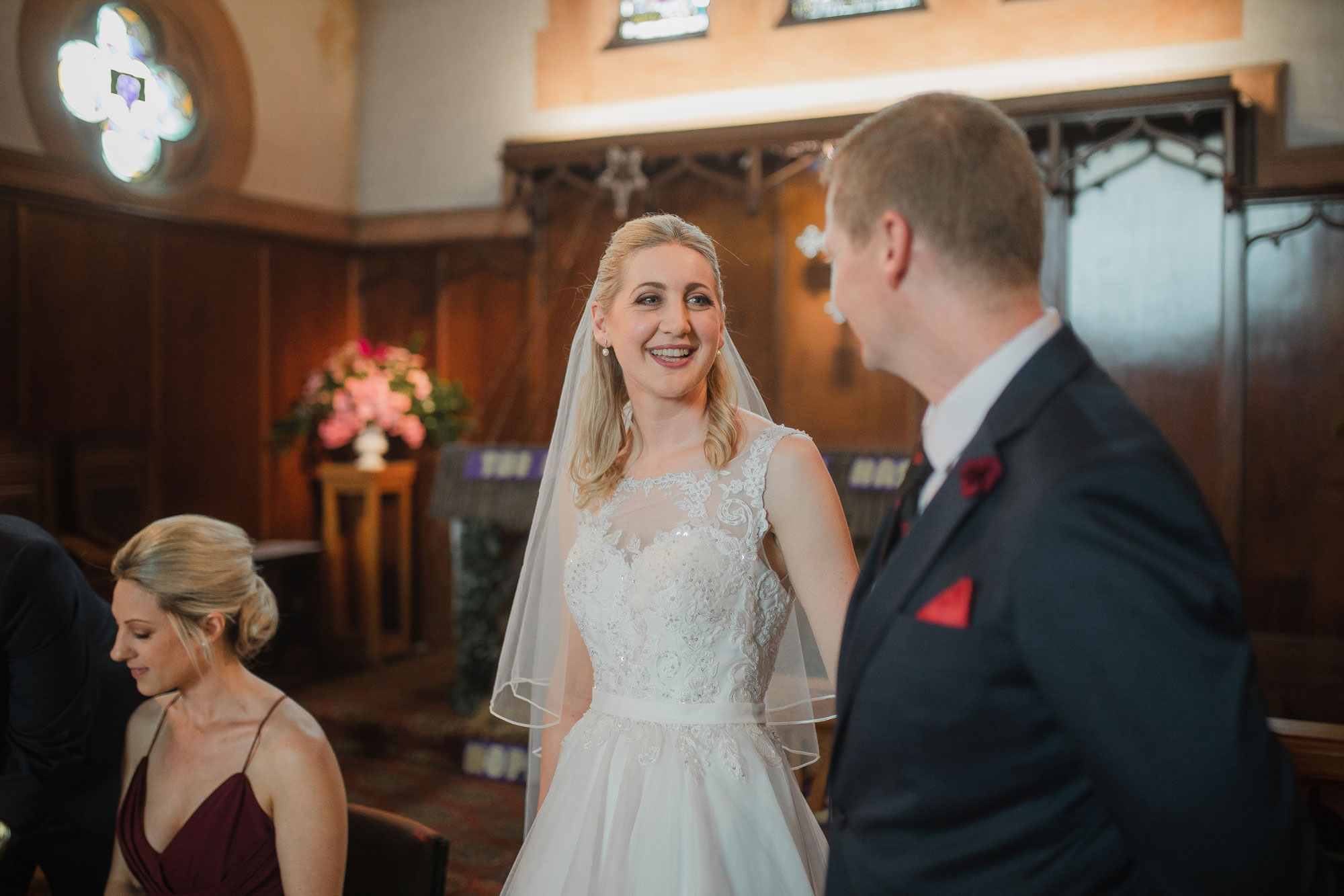 bride smiling at the groom