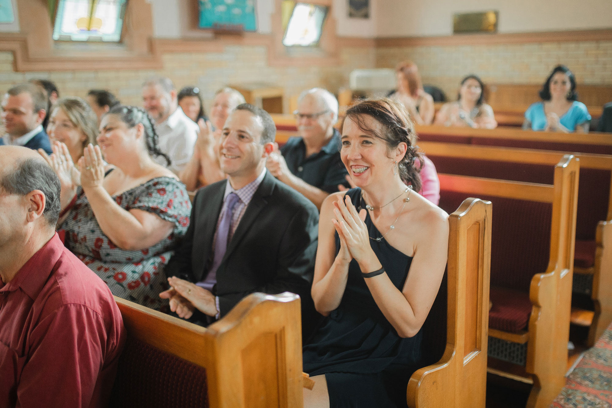 wedding guests clapping