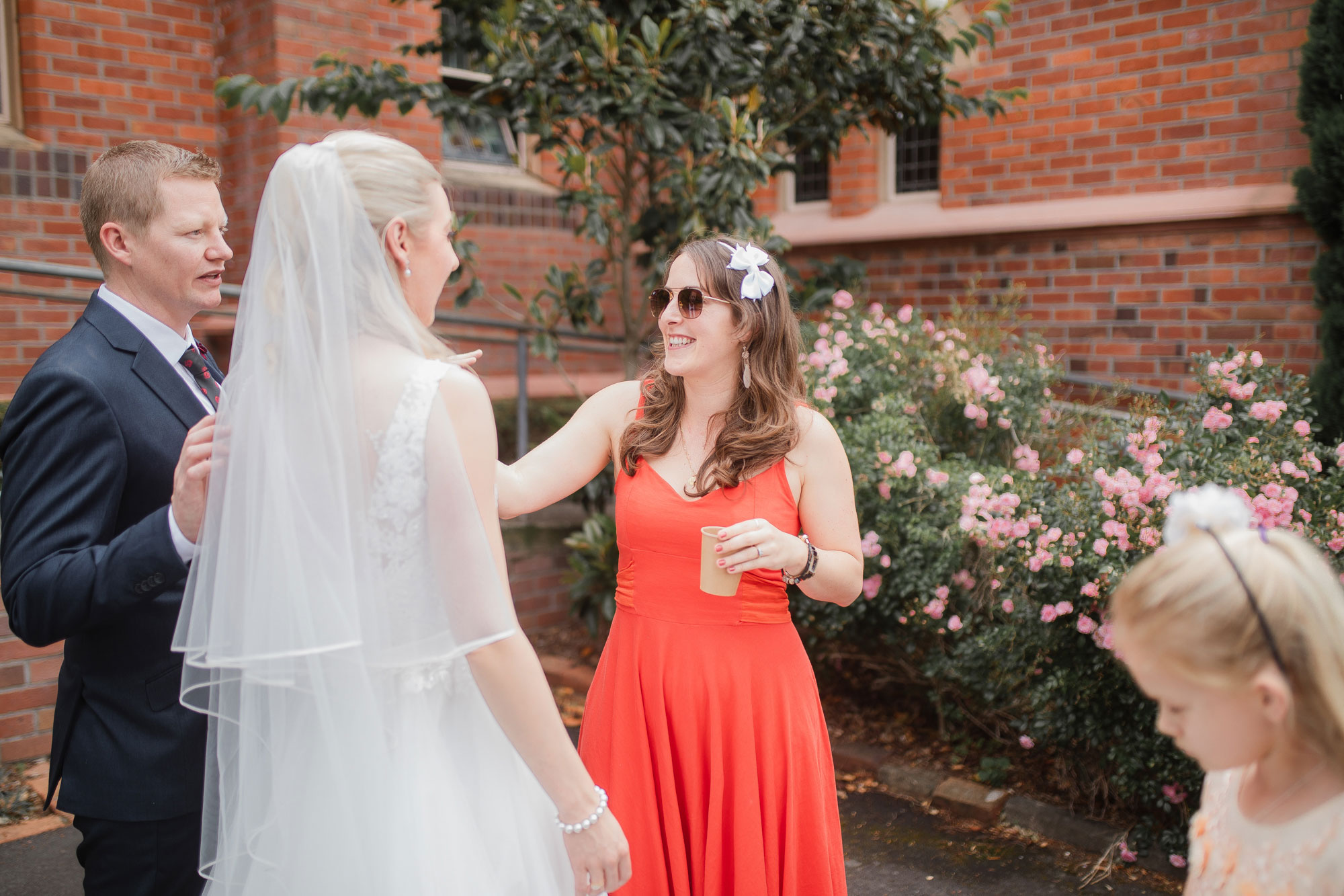 guest talking to the bride