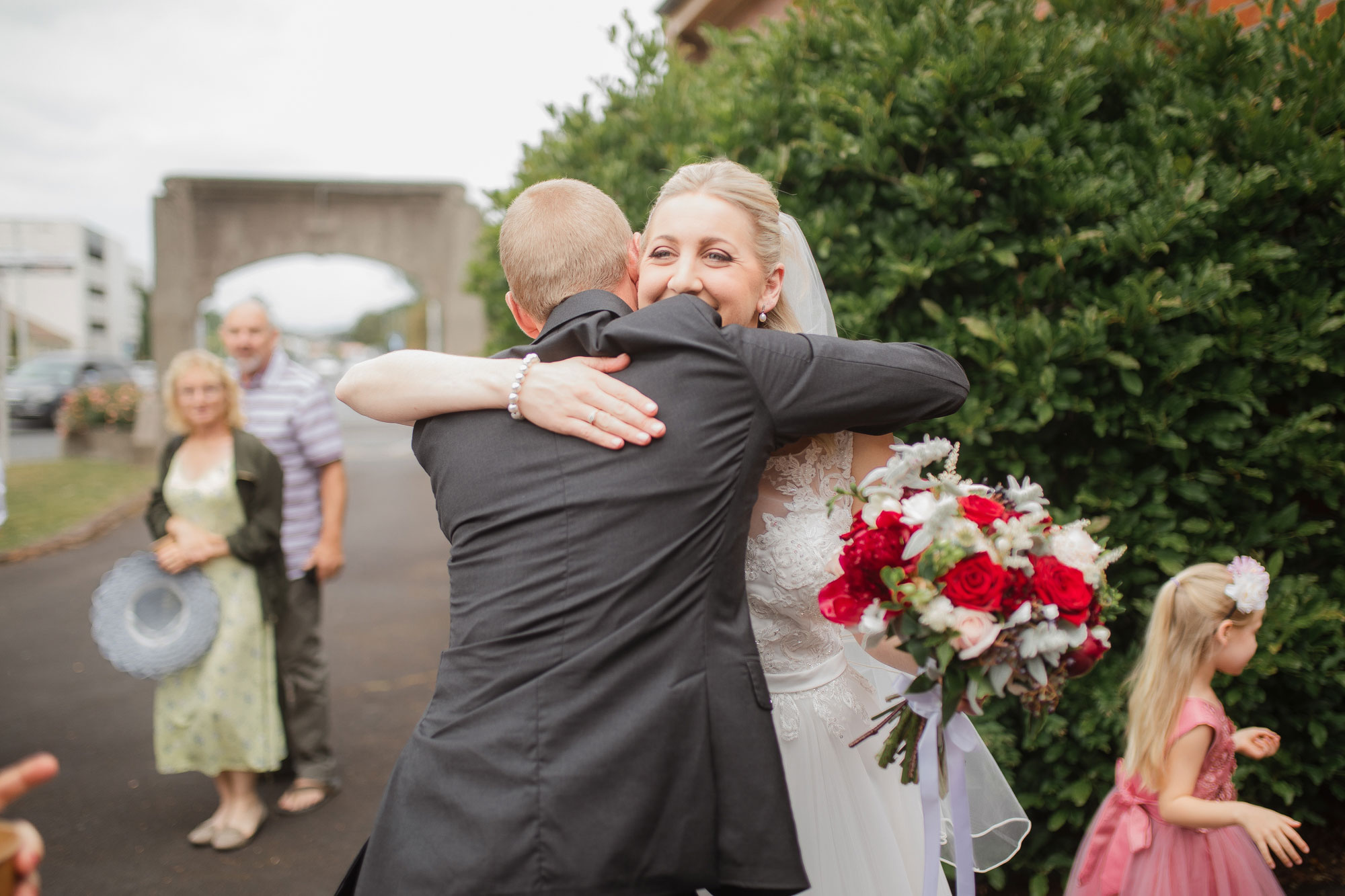 bride hugging guests