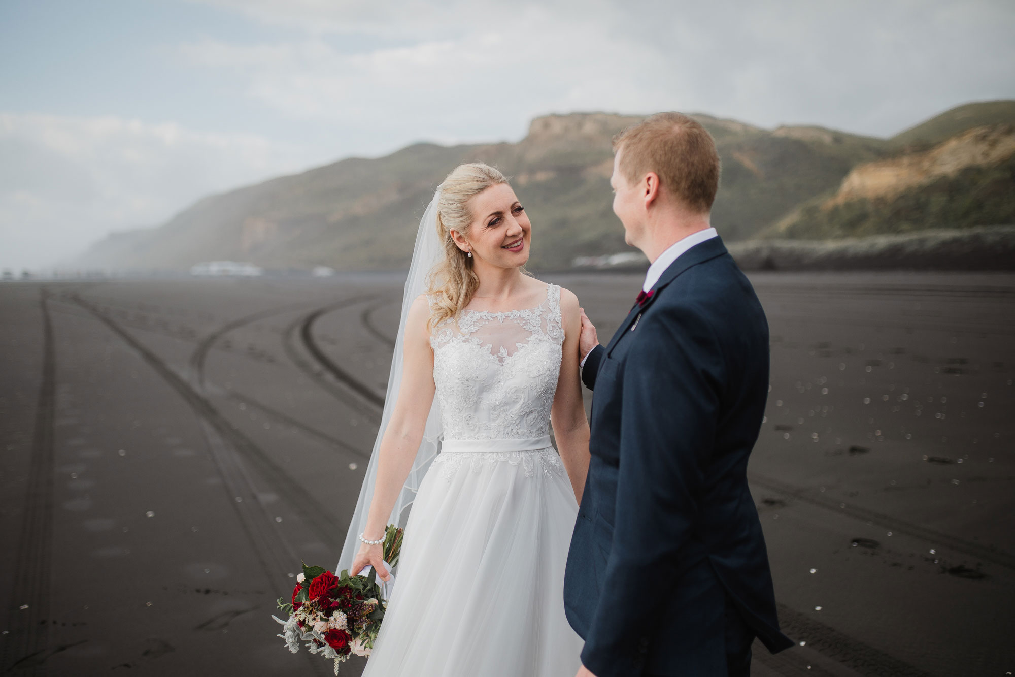 bride looking at the groom