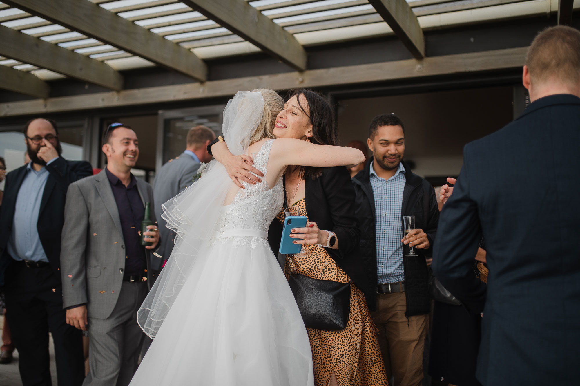 bride hugging a guest