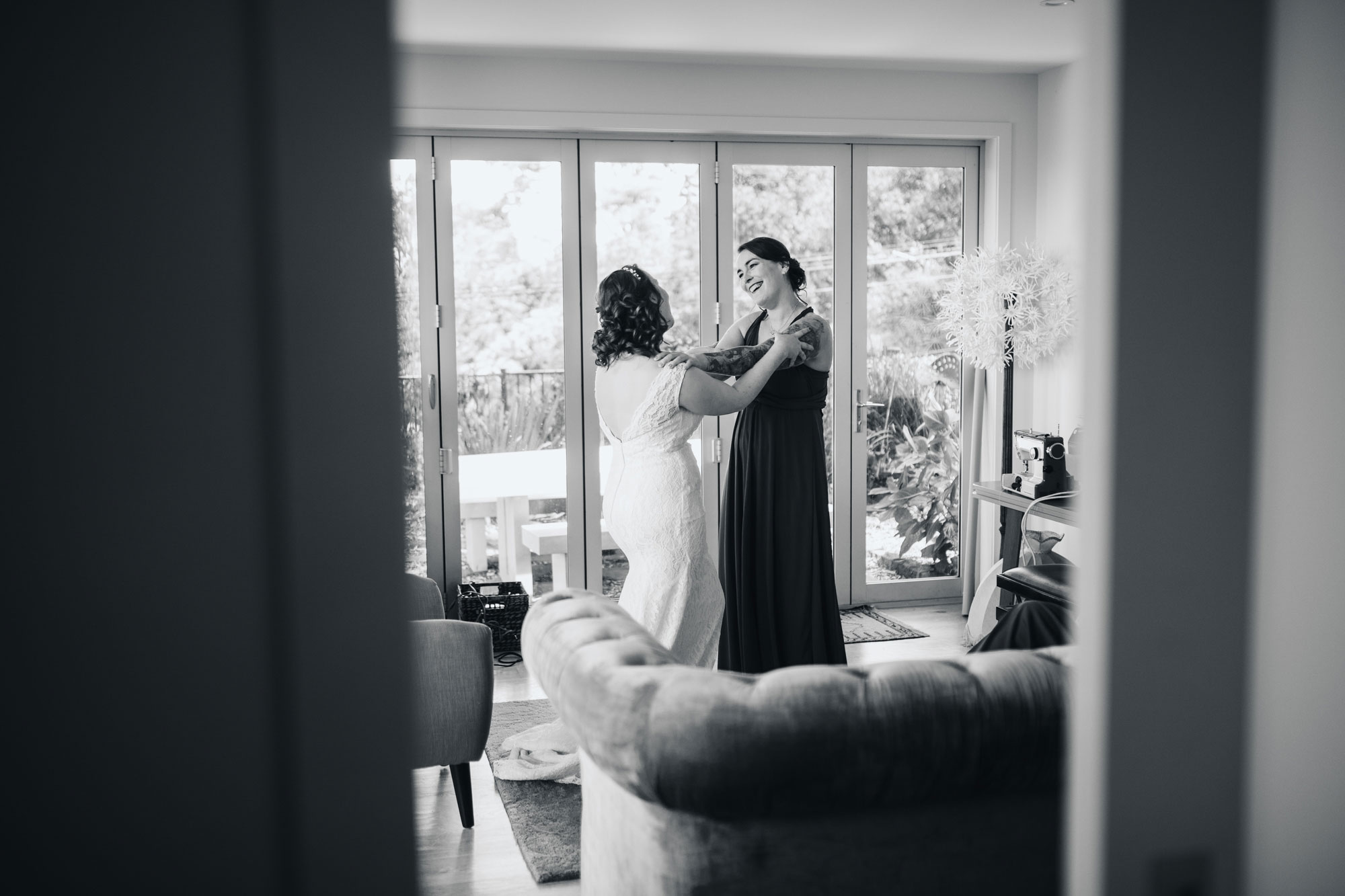 bride having a moment with her sister