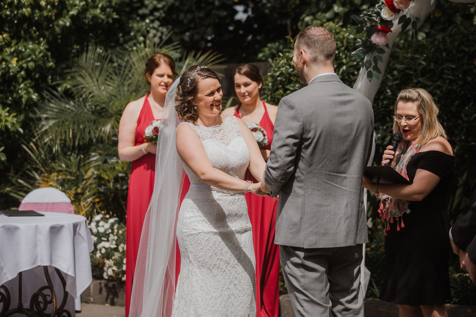 bride laughing at the wedding ceremony