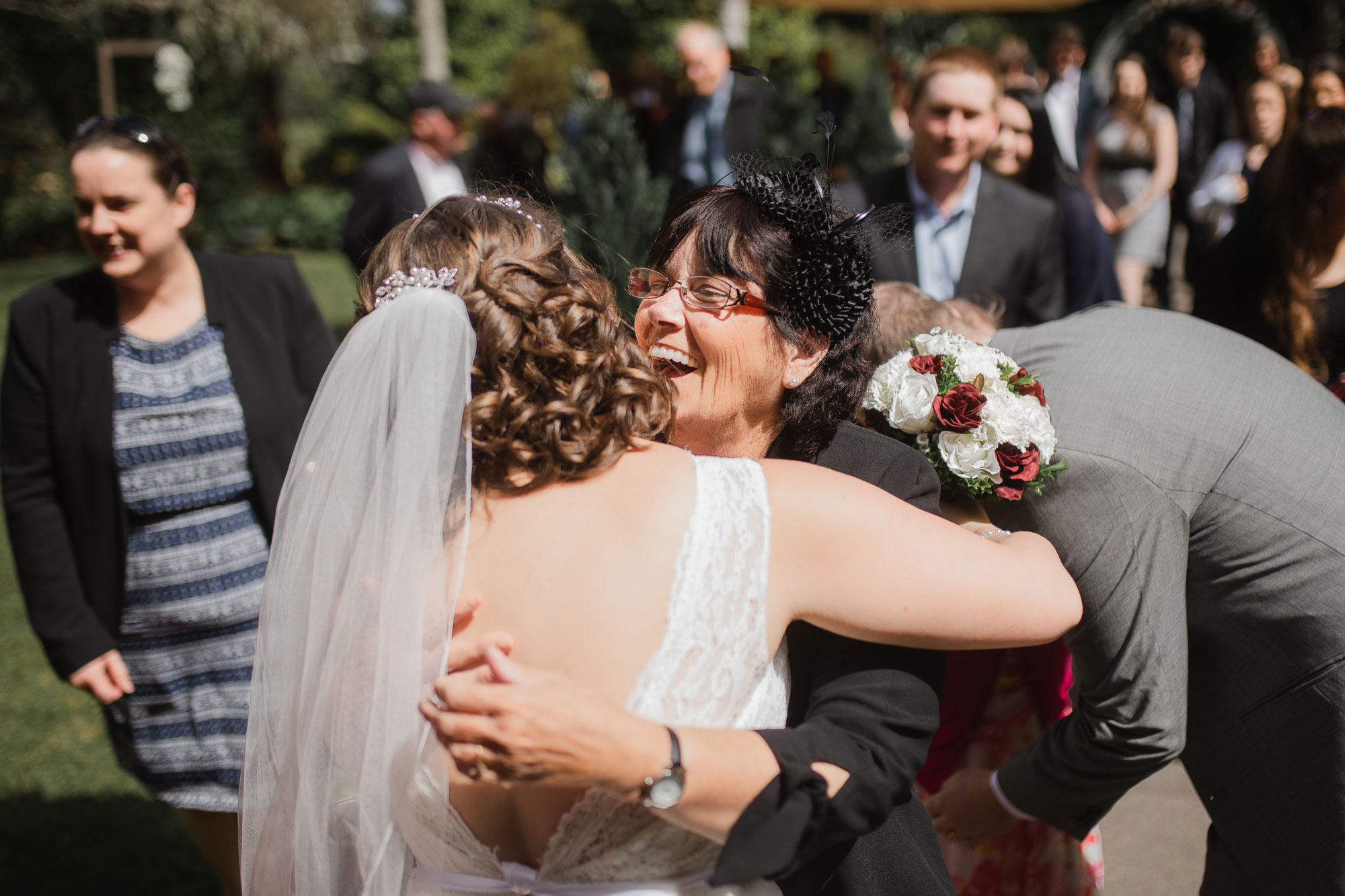 mother of the bride embracing her