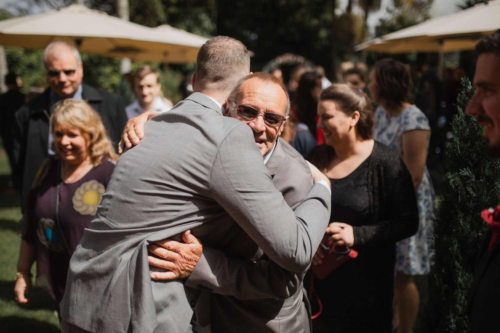 hugging the groom