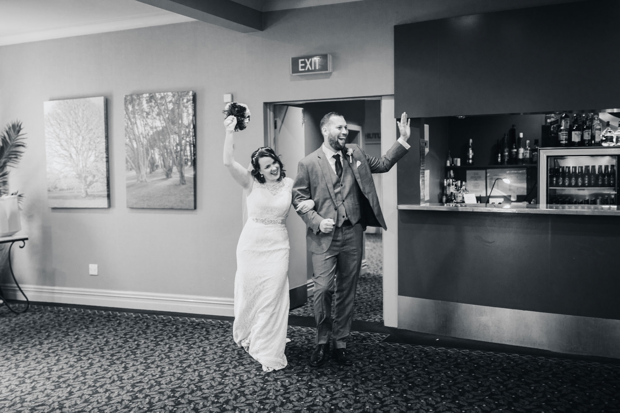 bride and groom arrive at reception