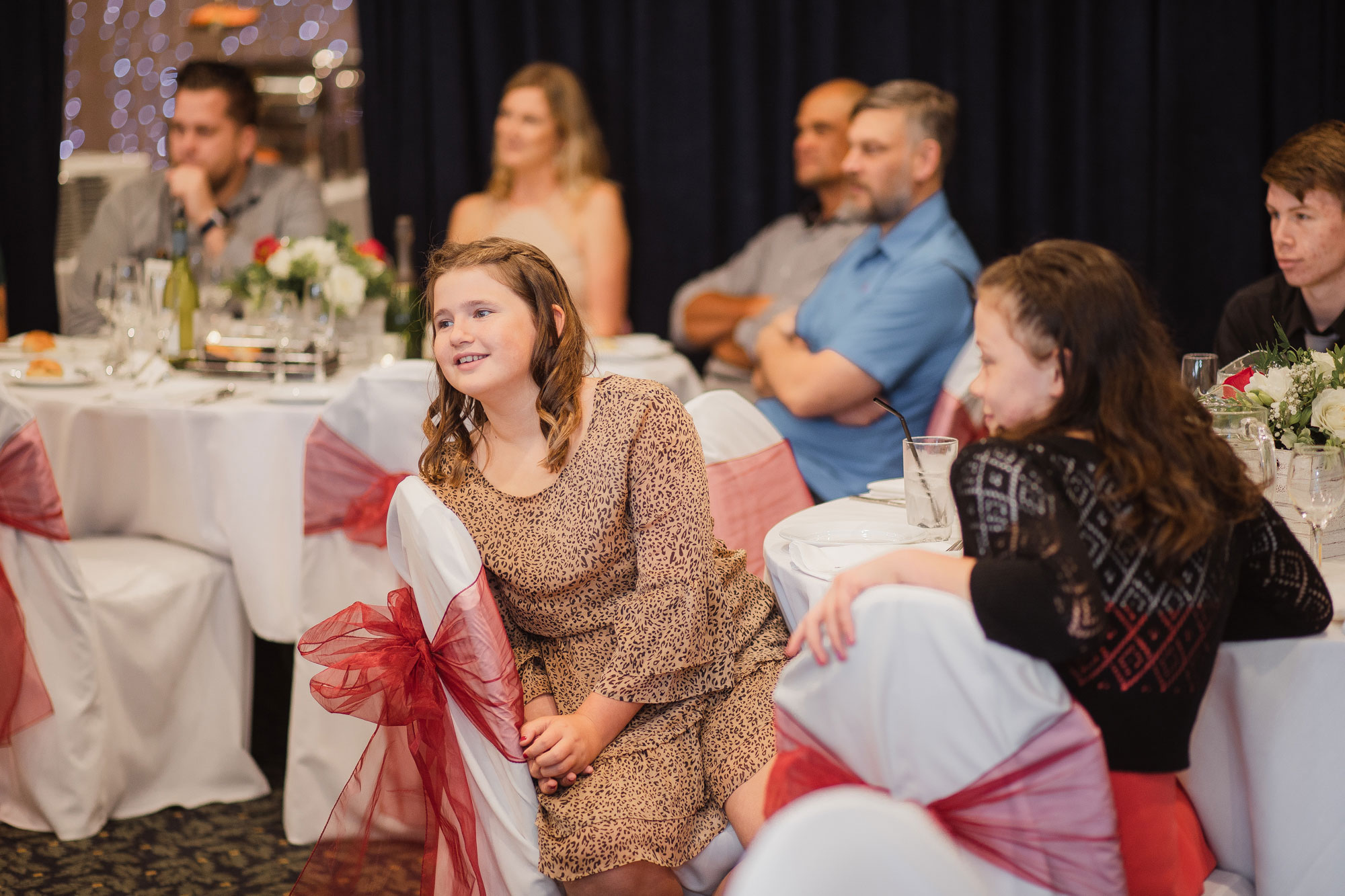 wedding guests listening to speeches