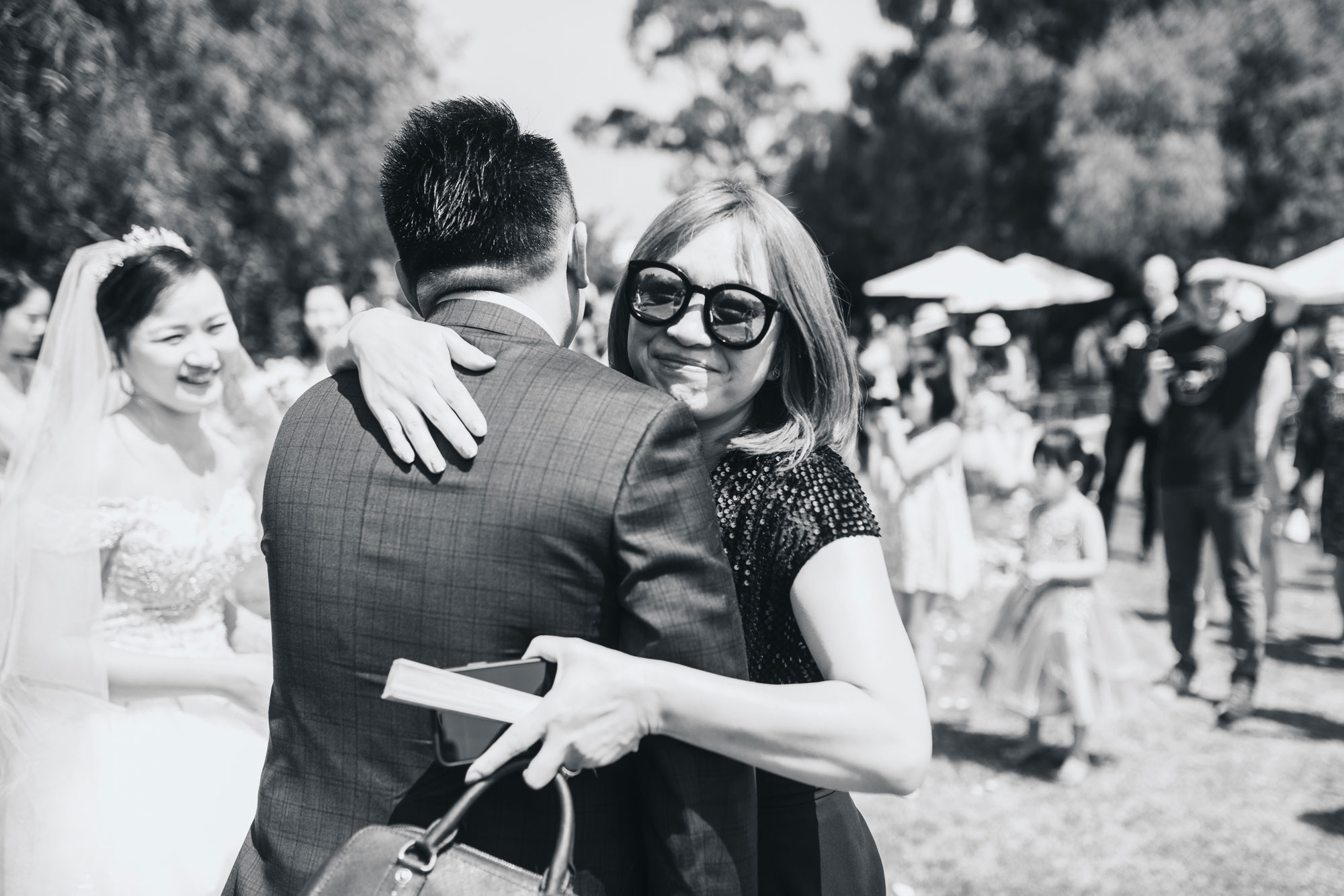 guest hugging groom