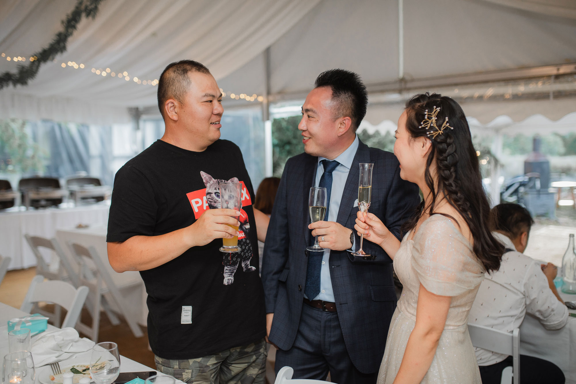 couple toasts during wedding reception