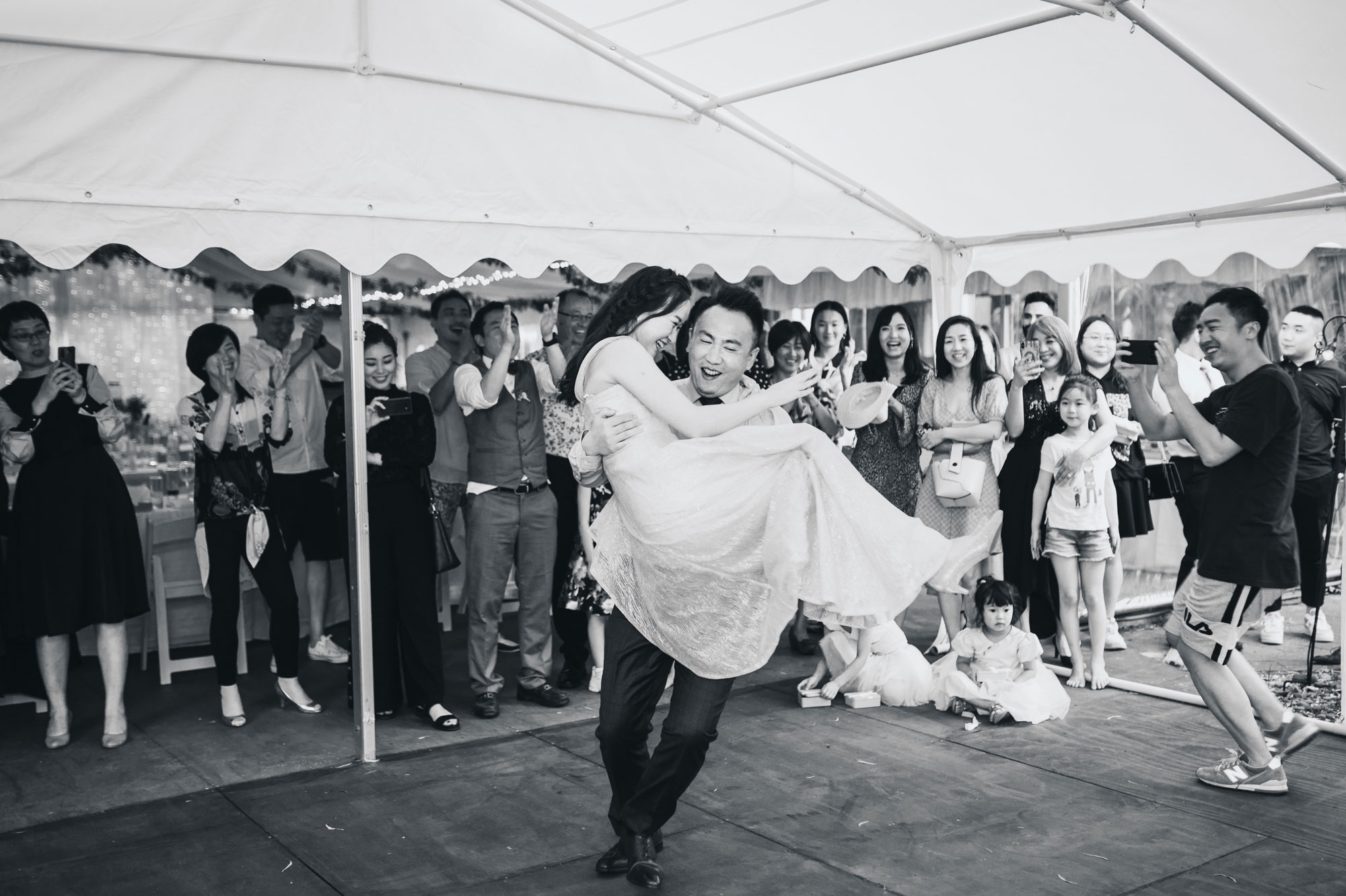 groom lifting bride first dance