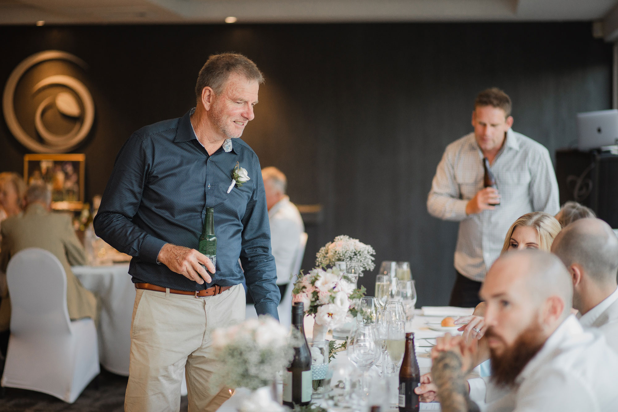 father of the groom talking