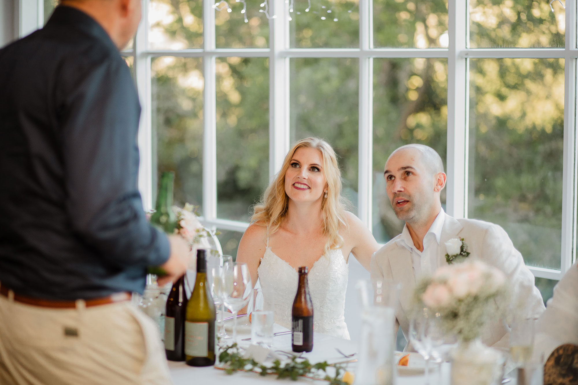 bride and groom talking