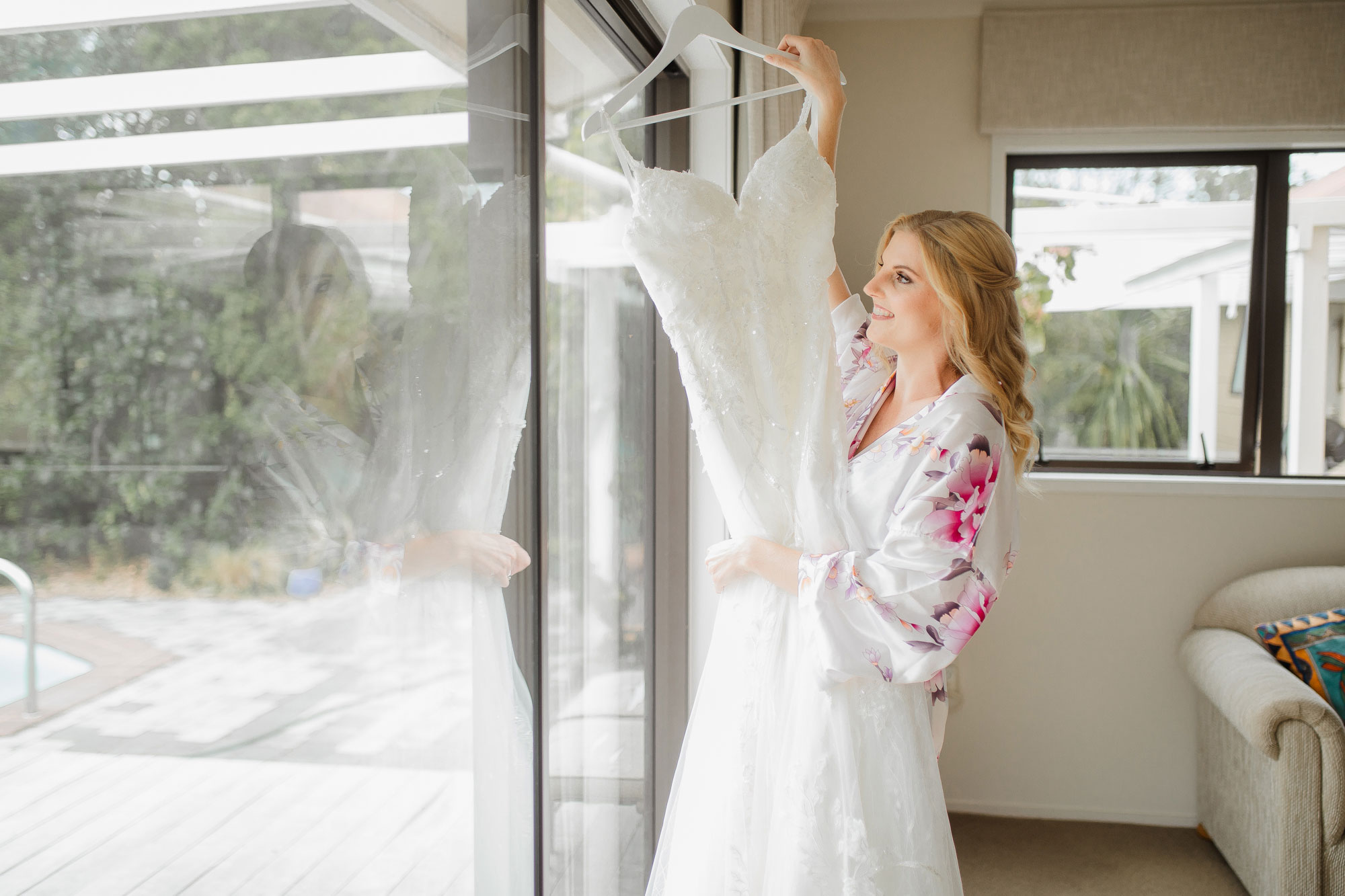 bride looking at her dress