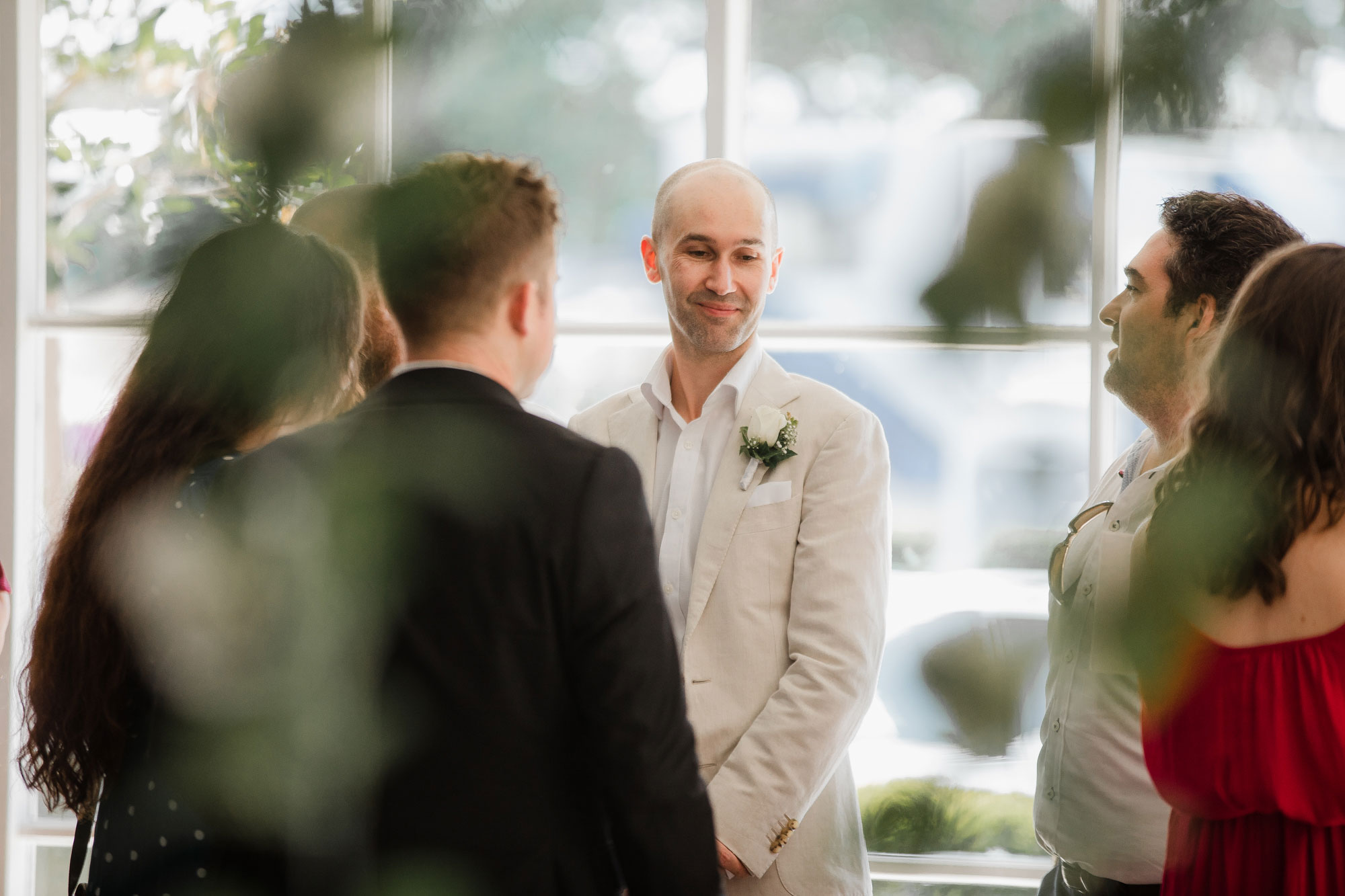 groom mingling with wedding guests