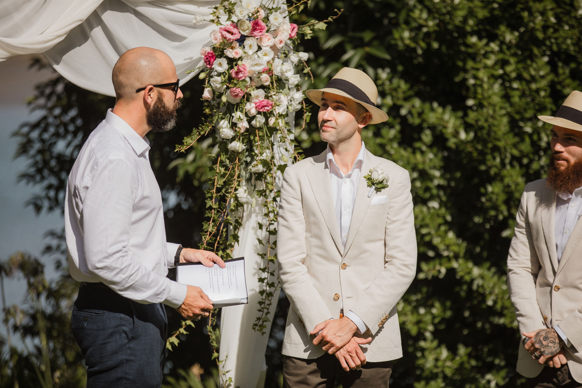 groom talking to the celebrant