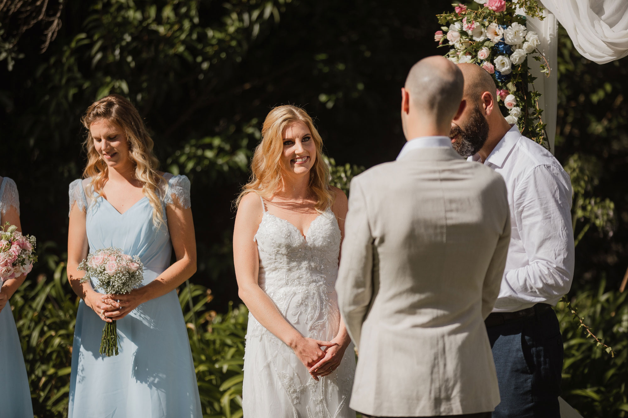 bride looking at the groom