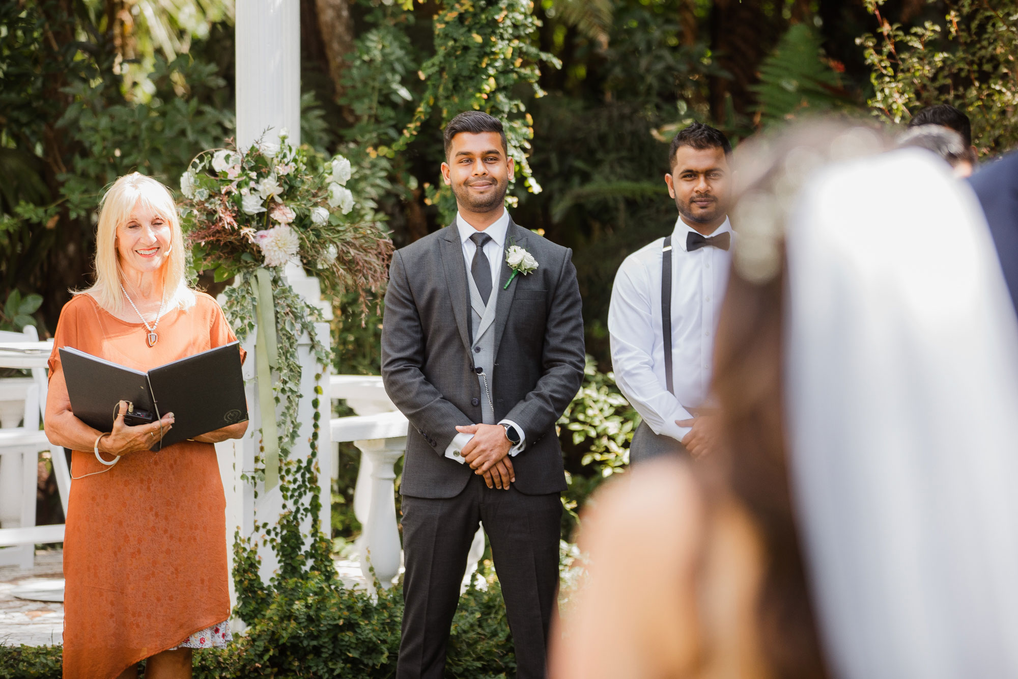 tui hills groom looking at the bride