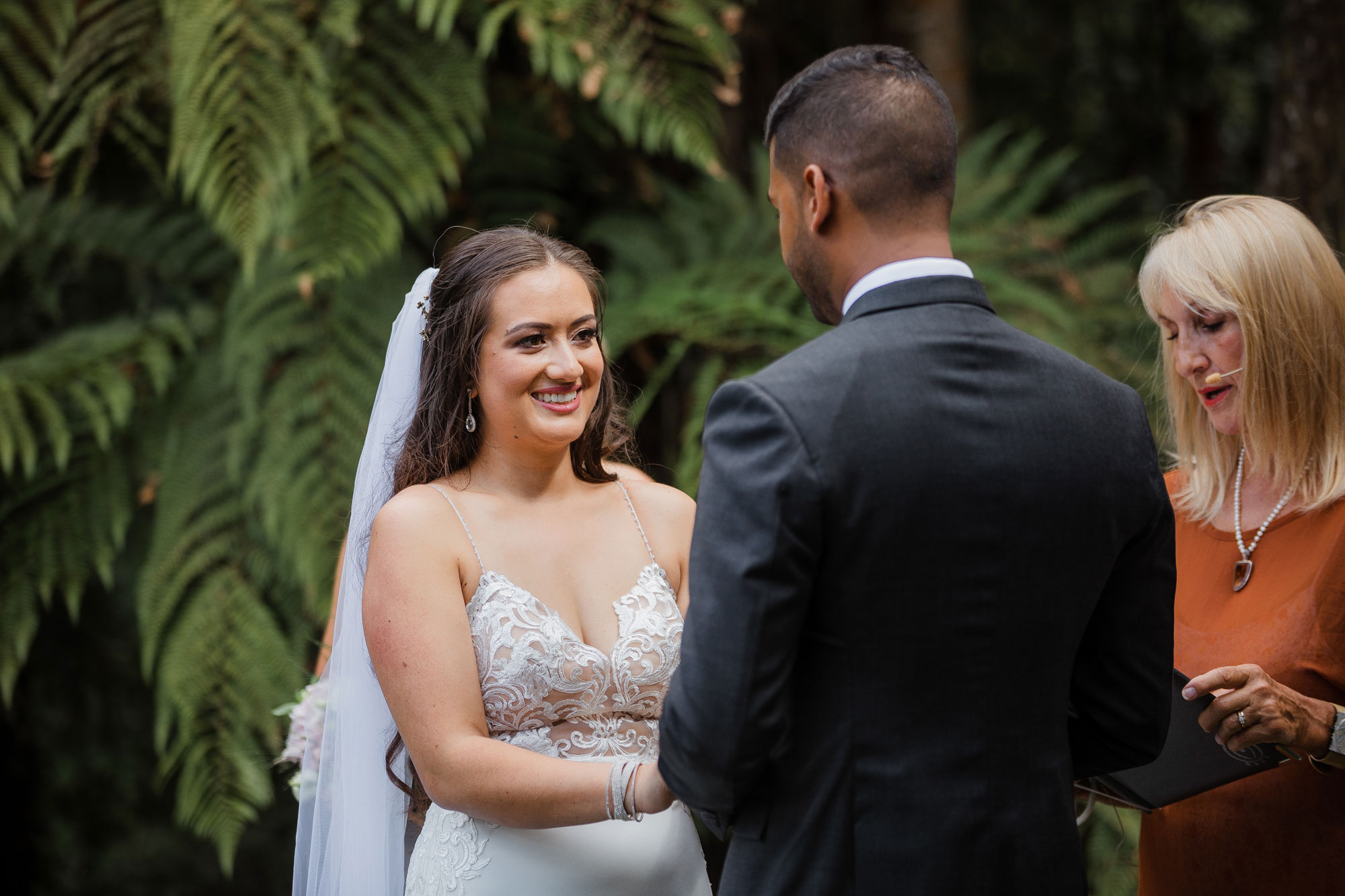 bride smiling at the groom