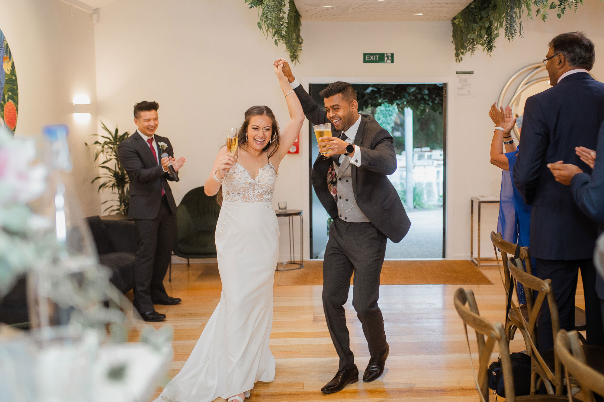 bride and groom entering tui hills reception