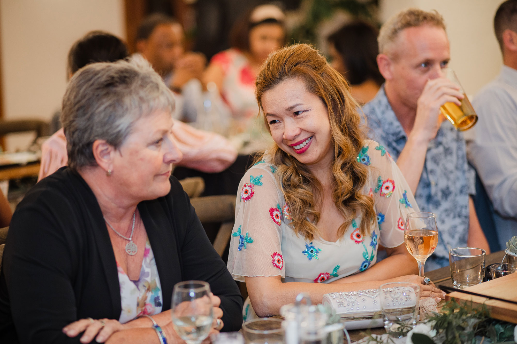 wedding guests smiling