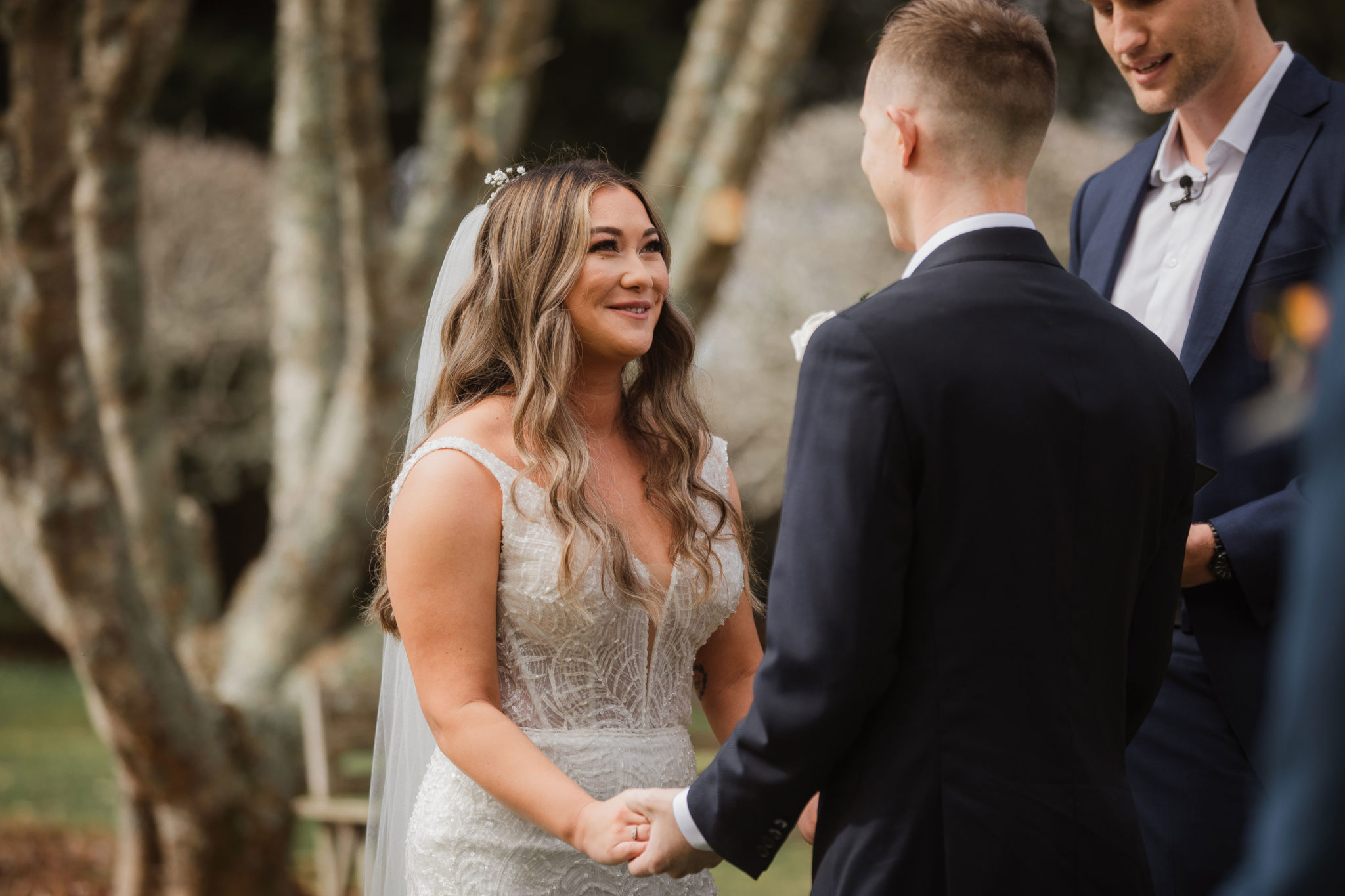 bride smiling at the groom