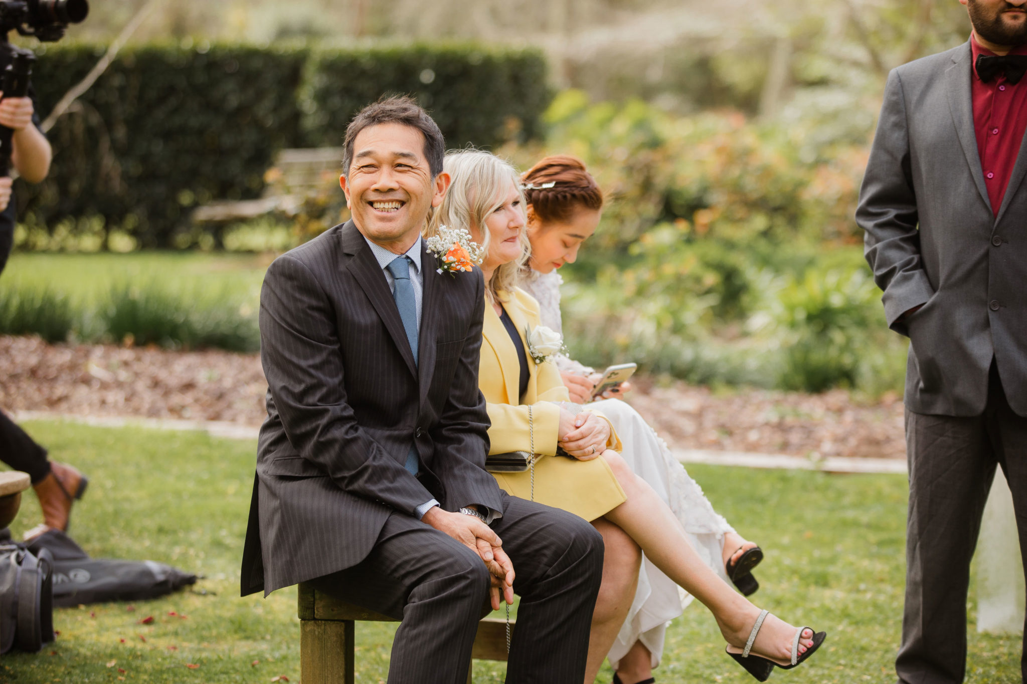 father of the bride smiling