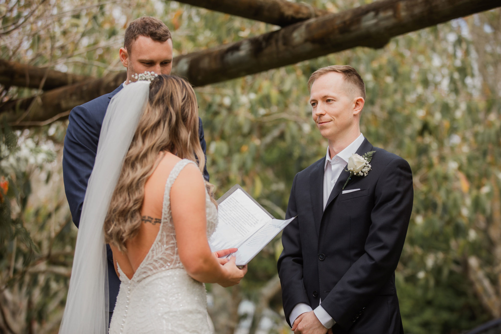 groom smiling at the bride