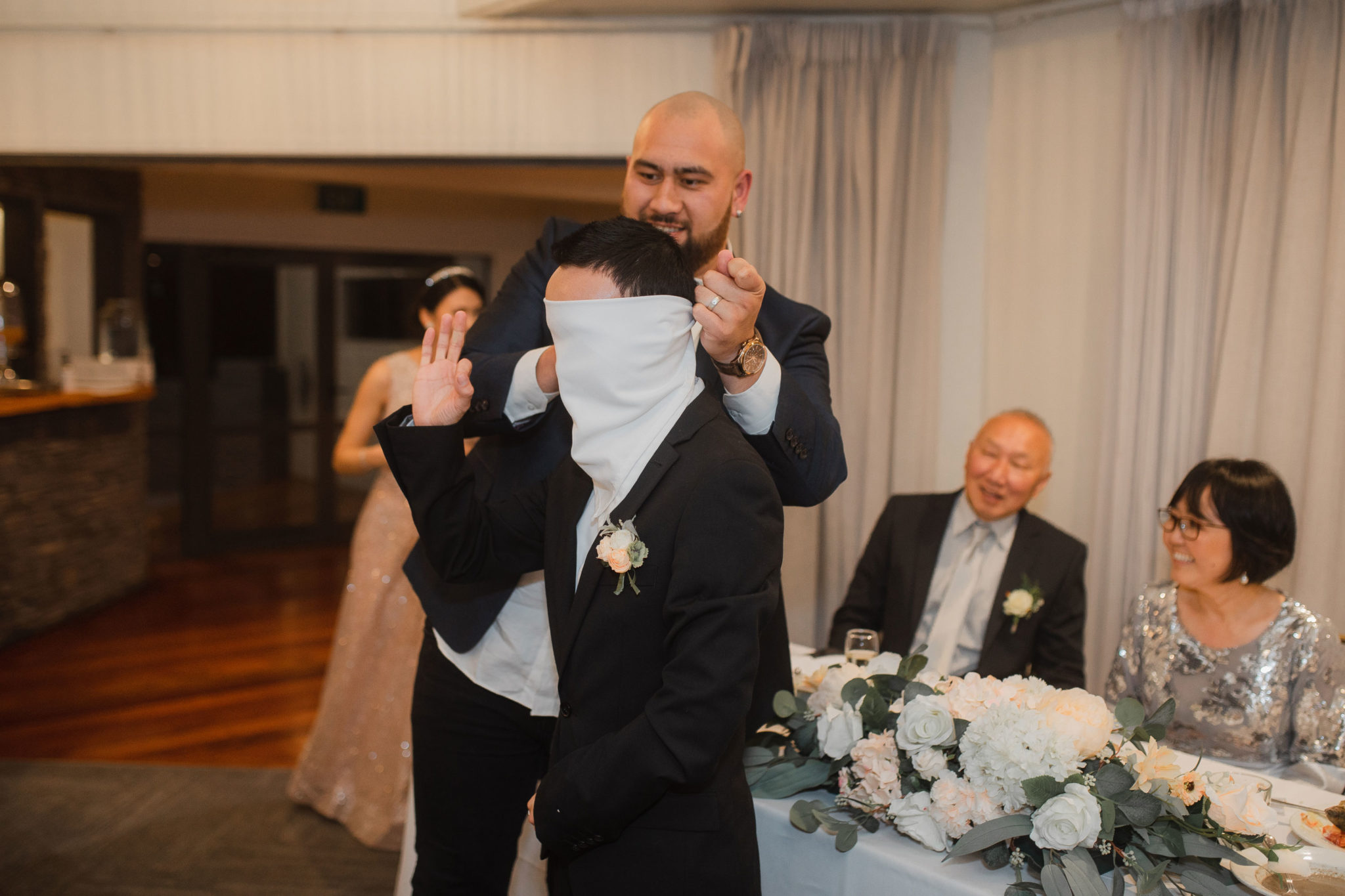 groom blindfold