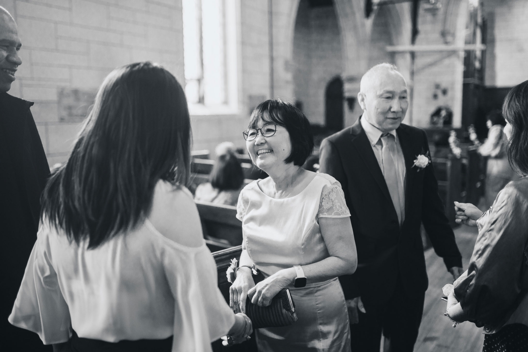 mother of the groom mingling with guests