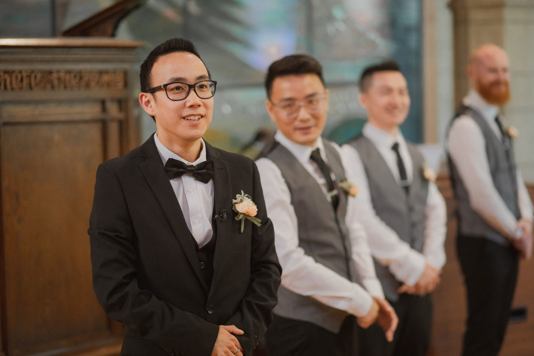 groom smiling before ceremony