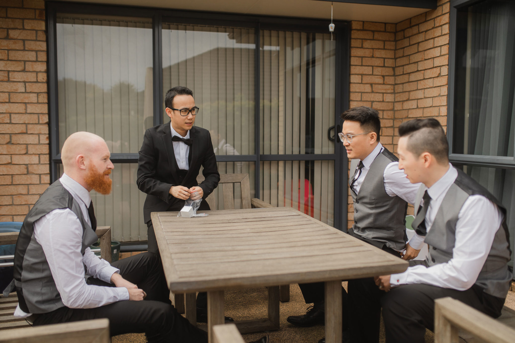 groomsmen discussing