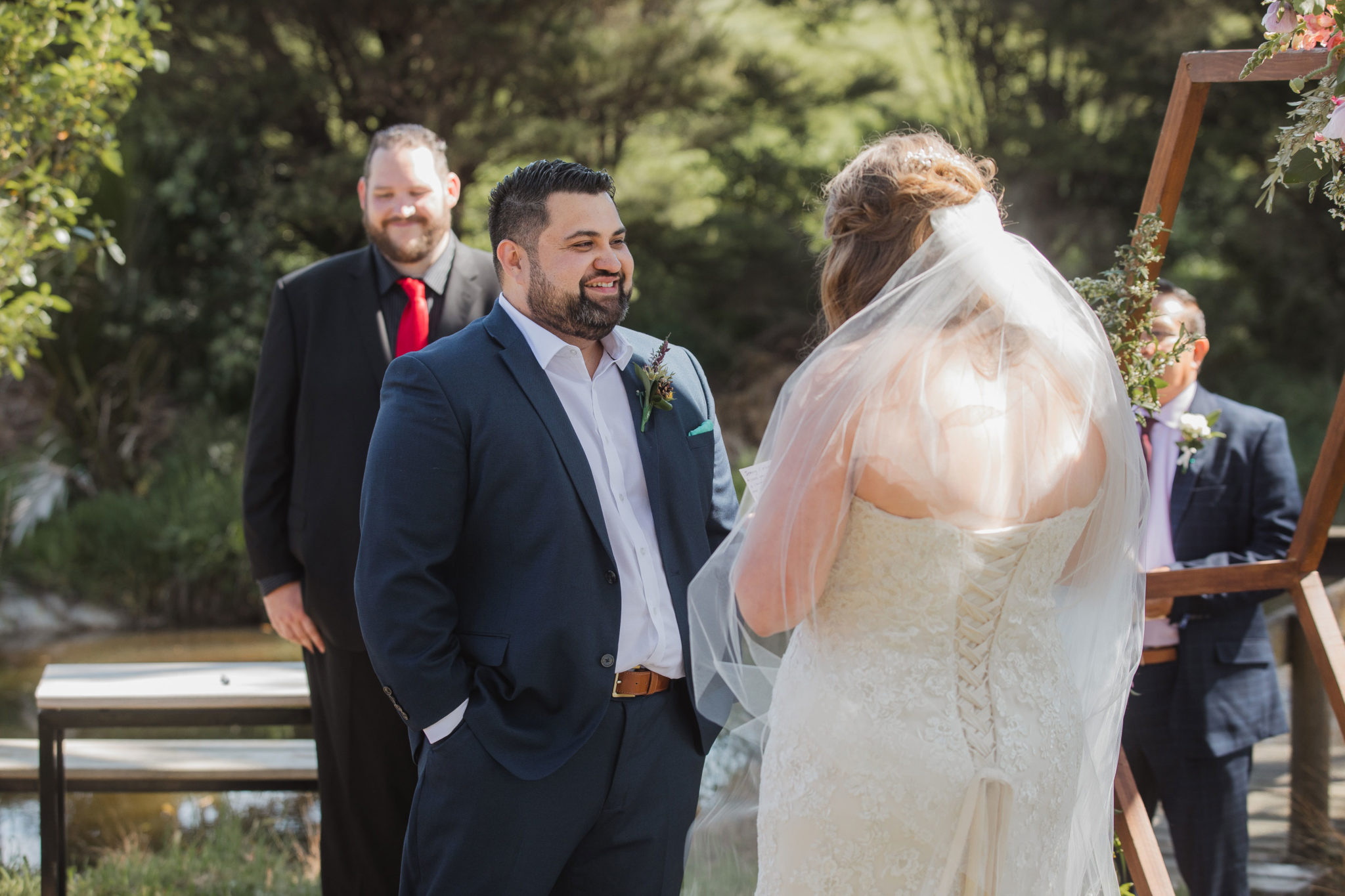 auckland groom smiling at the bride