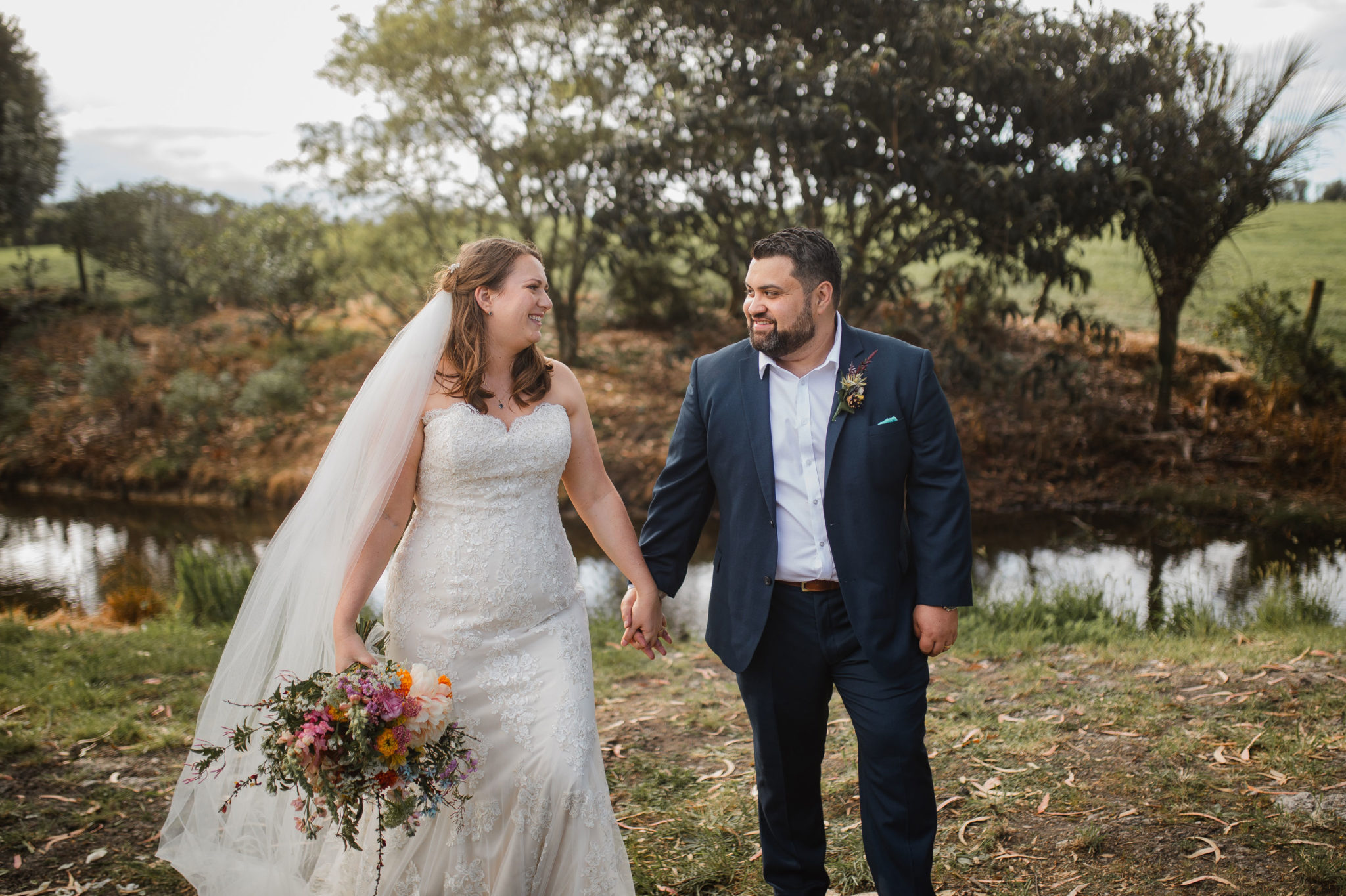 auckland bride and groom walking