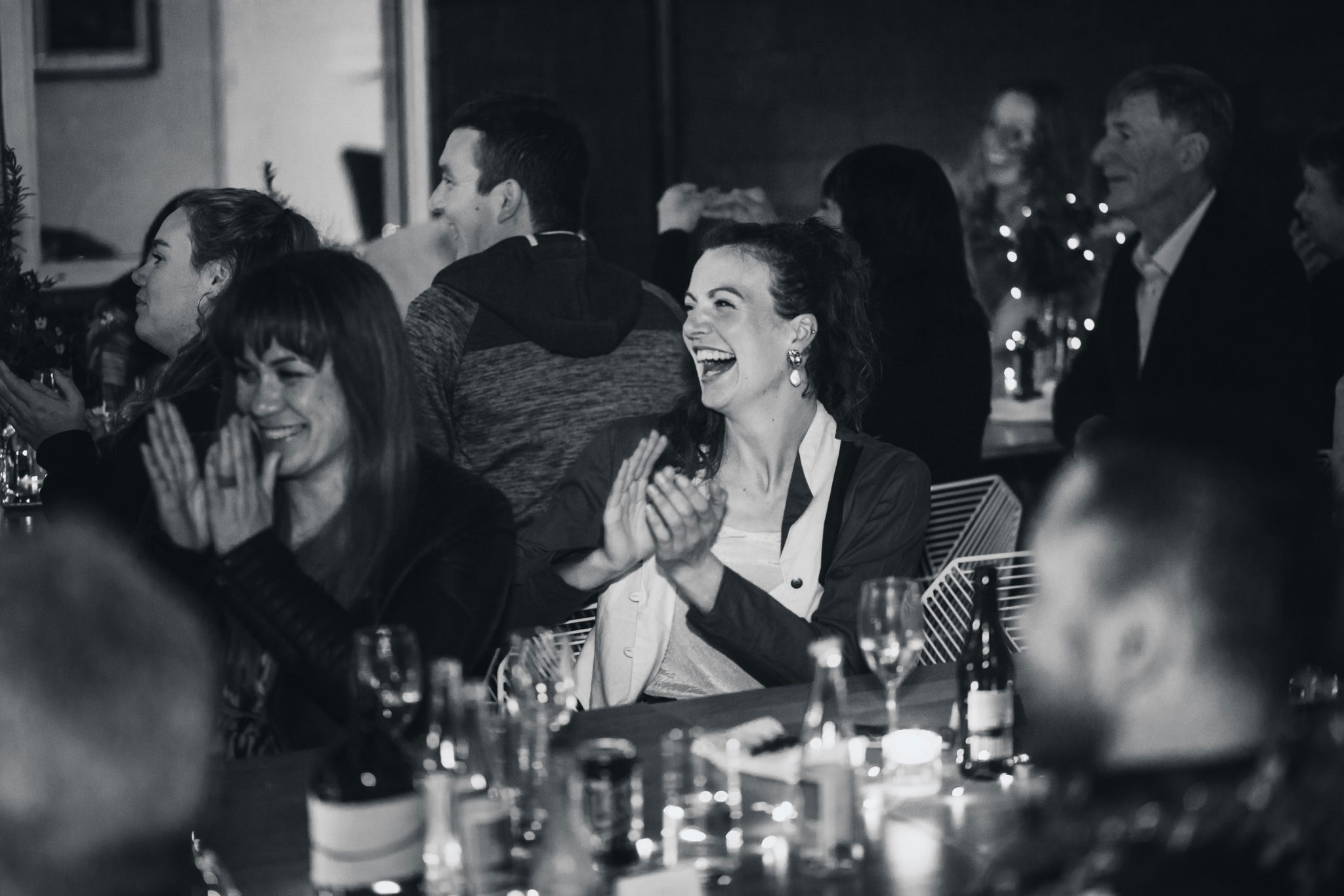 wedding guests laughing