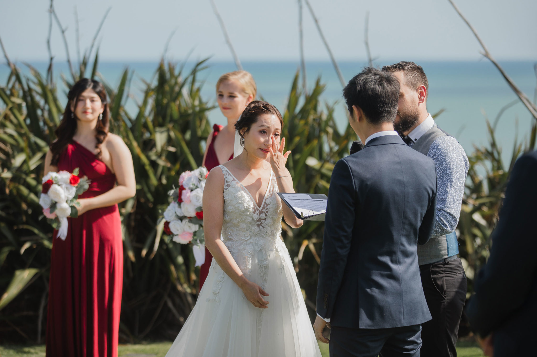 bride crying while listening to vows