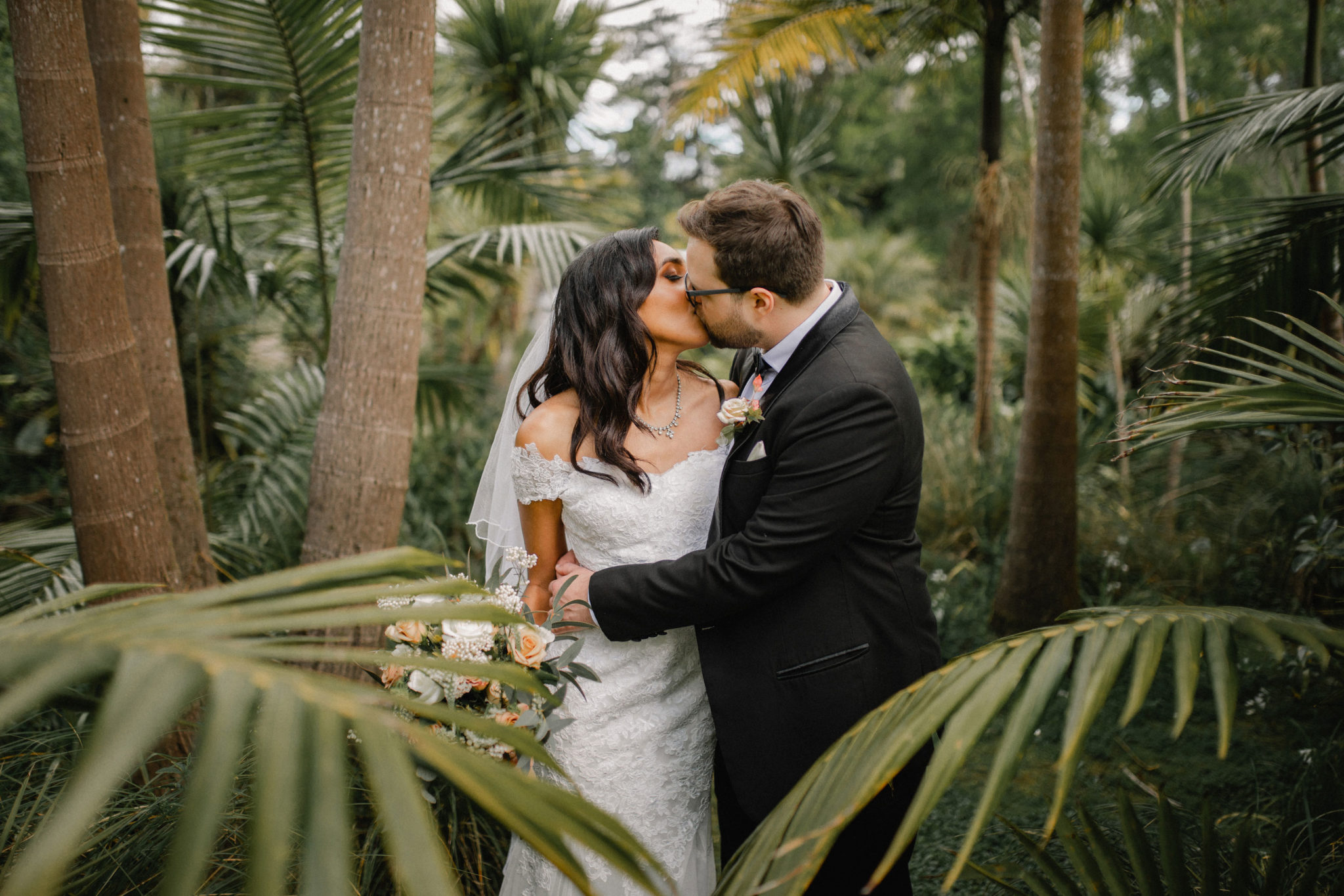 bride and groom kissing