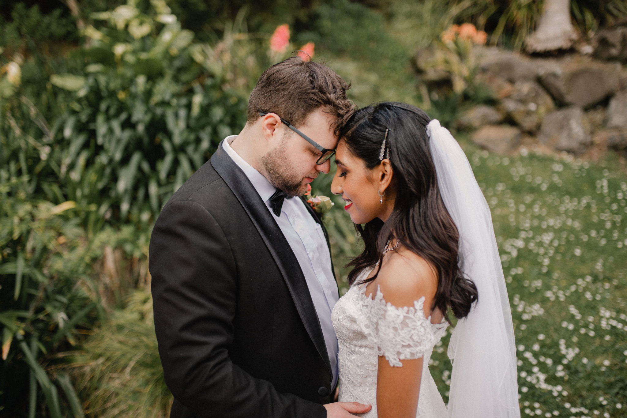 bride and groom embracing each other