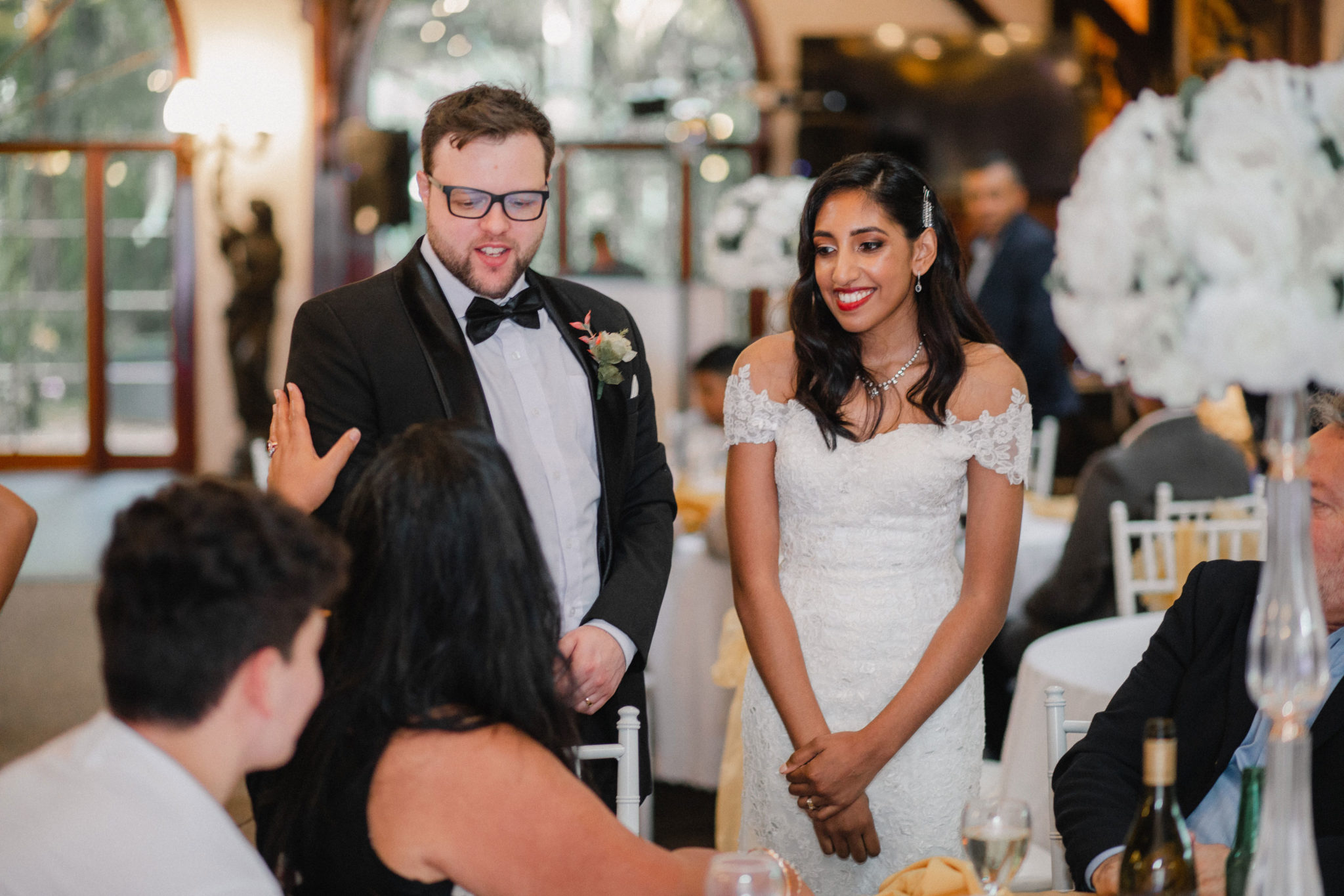 bride and groom greeting guests