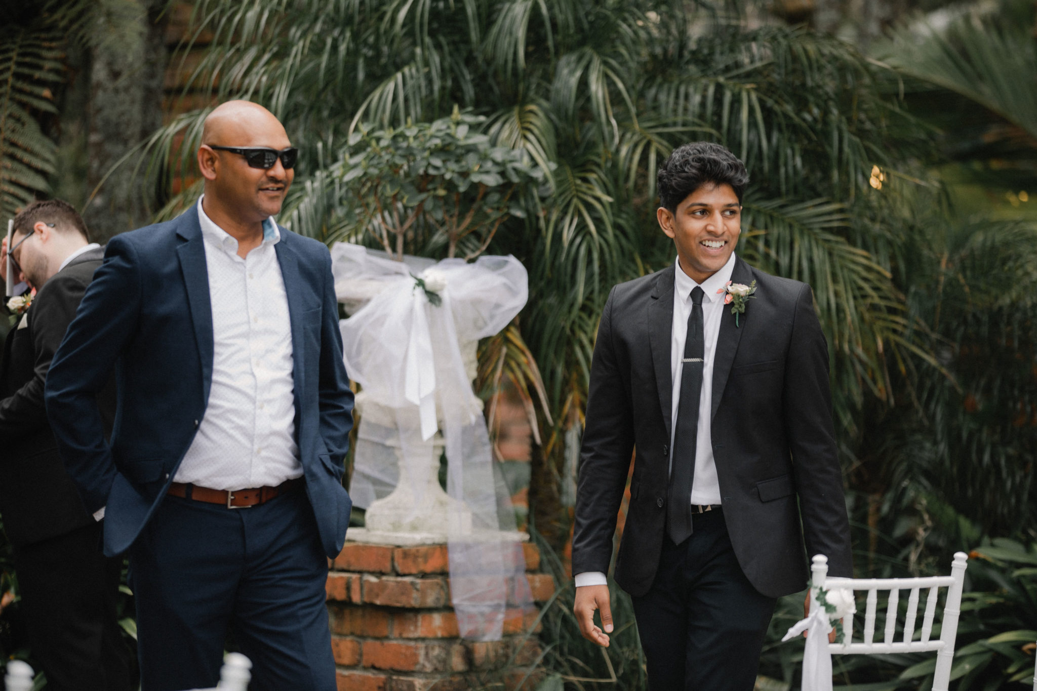 groomsmen smiling