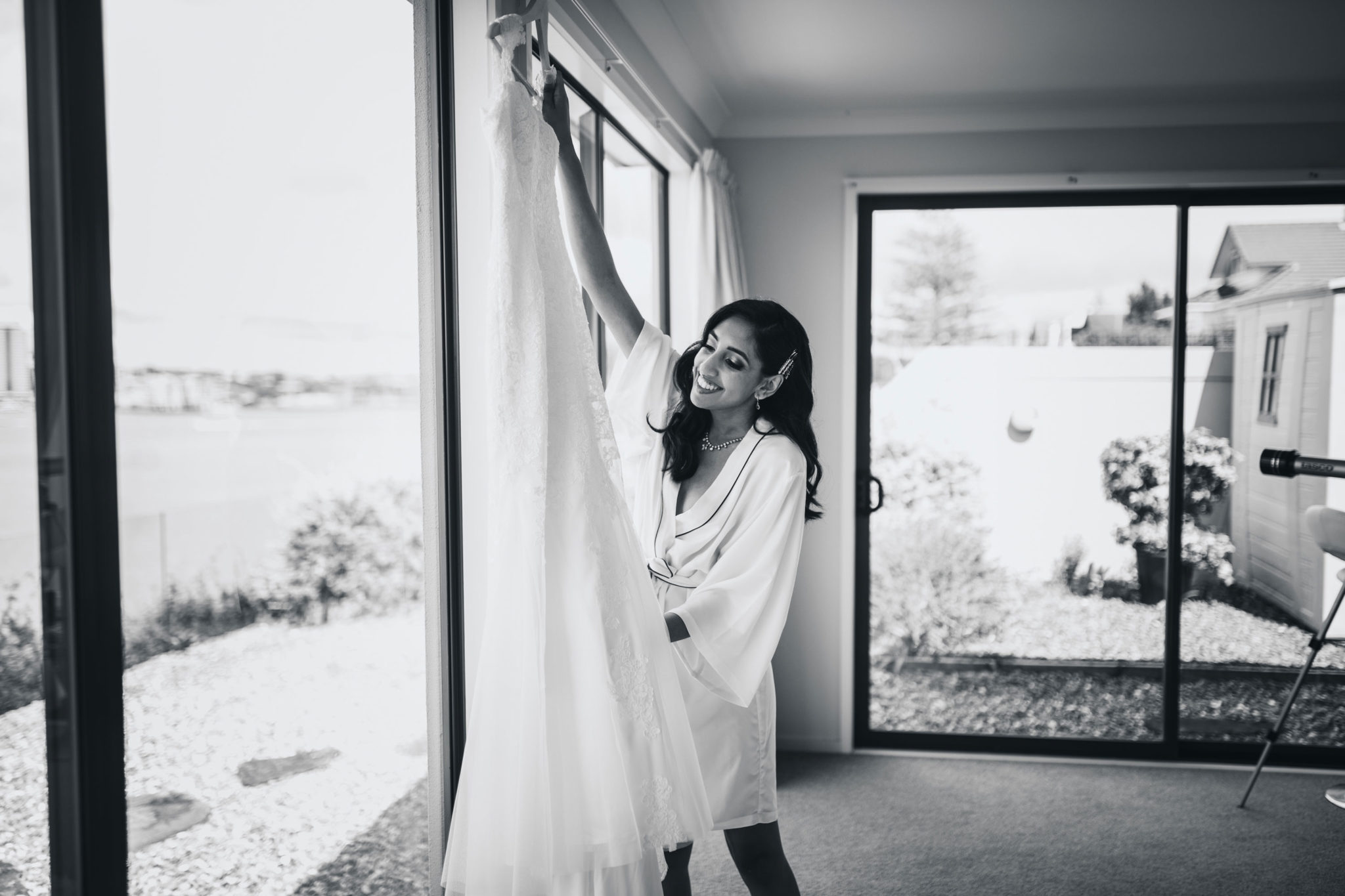 bride looking at her dress