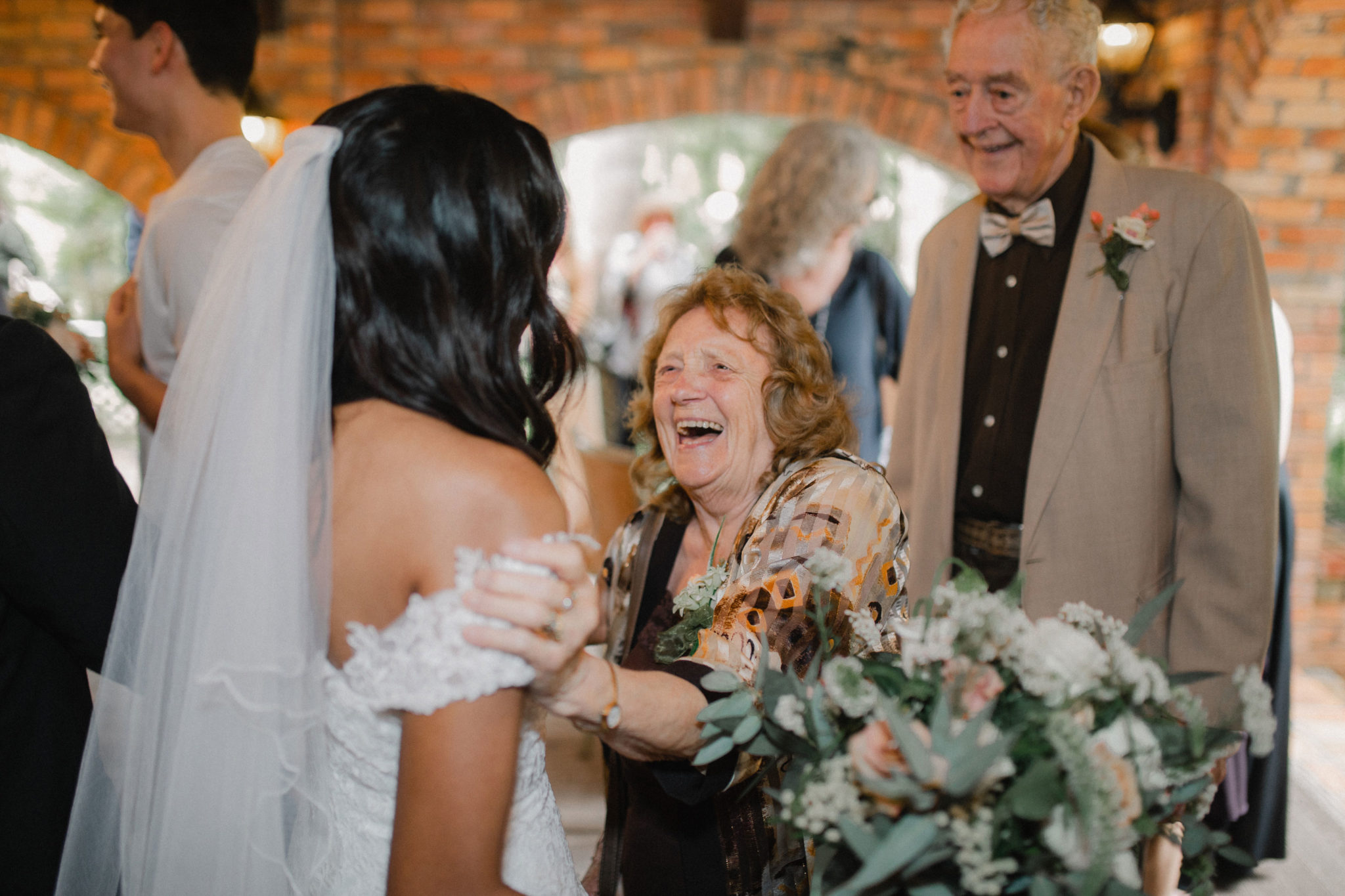 wedding guest congratulating the bride