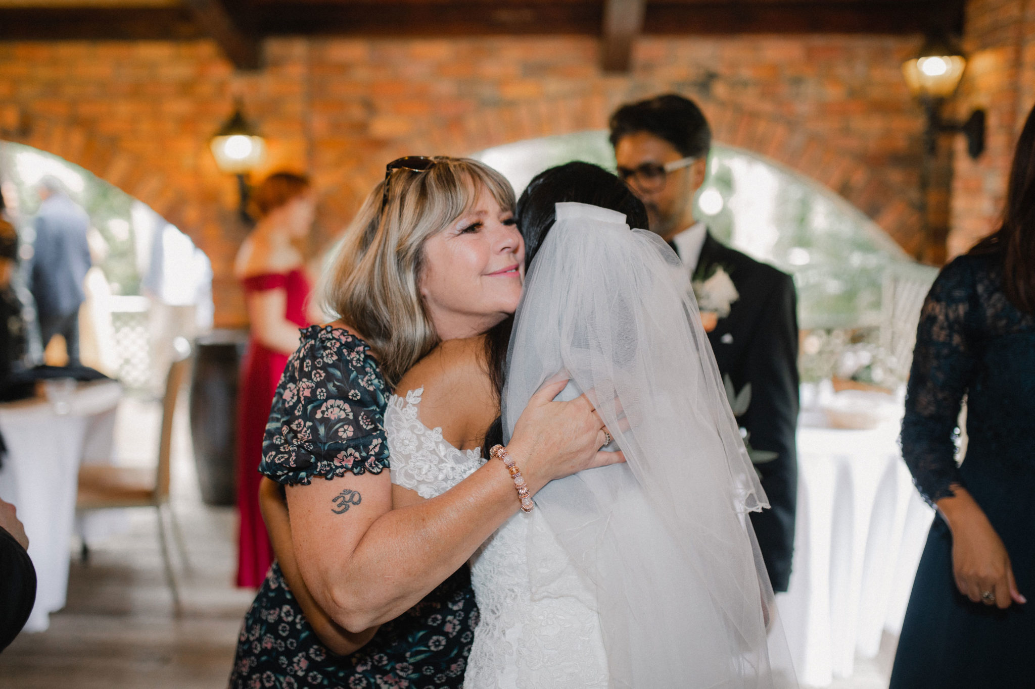 bride hugging mother of the groom