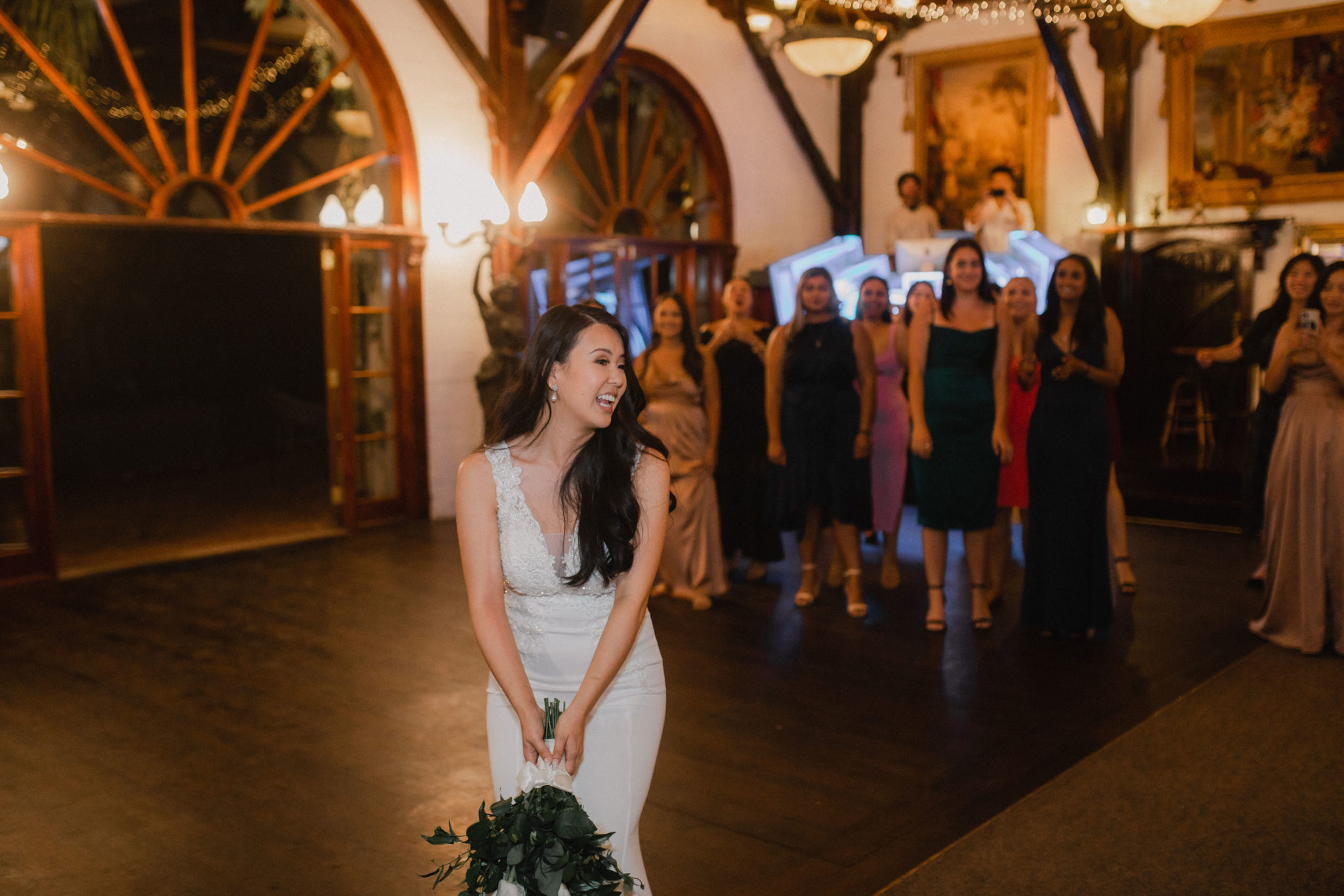 bride throwing bouquet