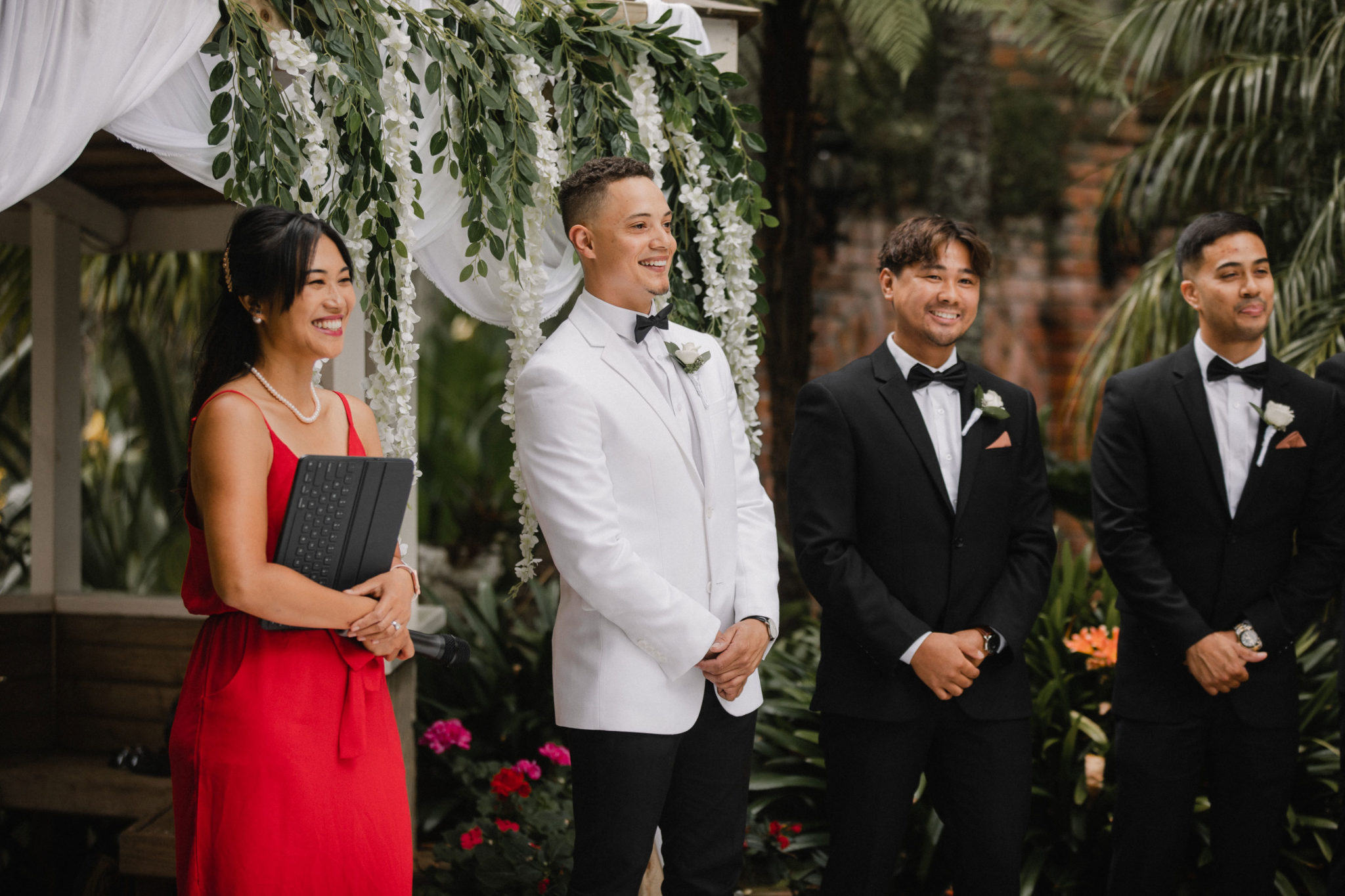 groom and the boys waiting at the altar