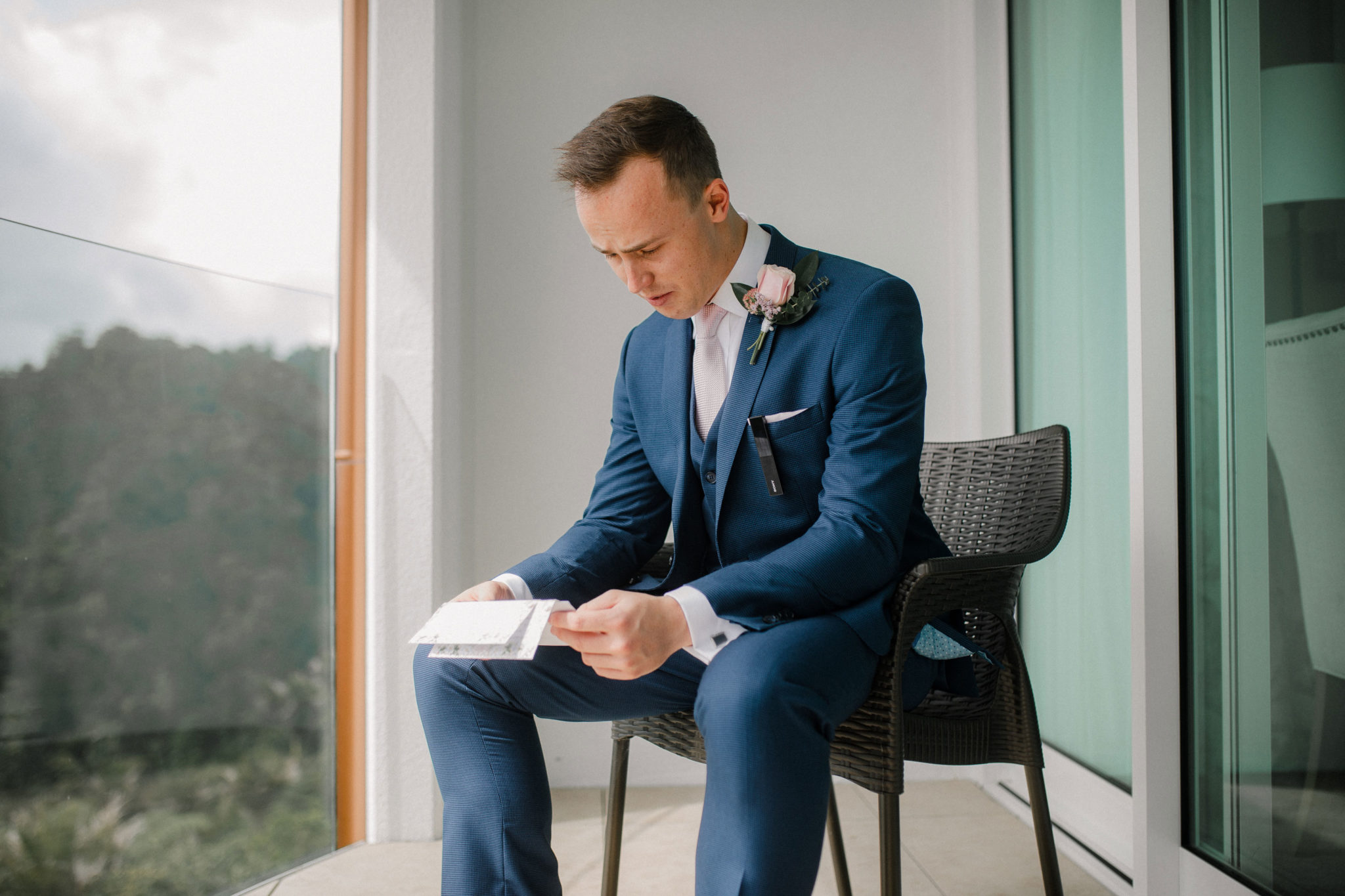groom tearing up reading letter
