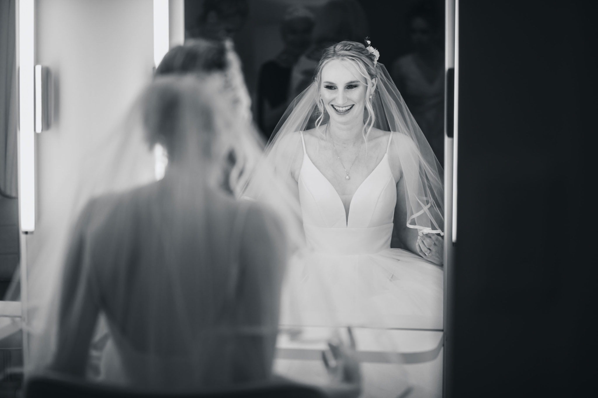 bride looking at her veil