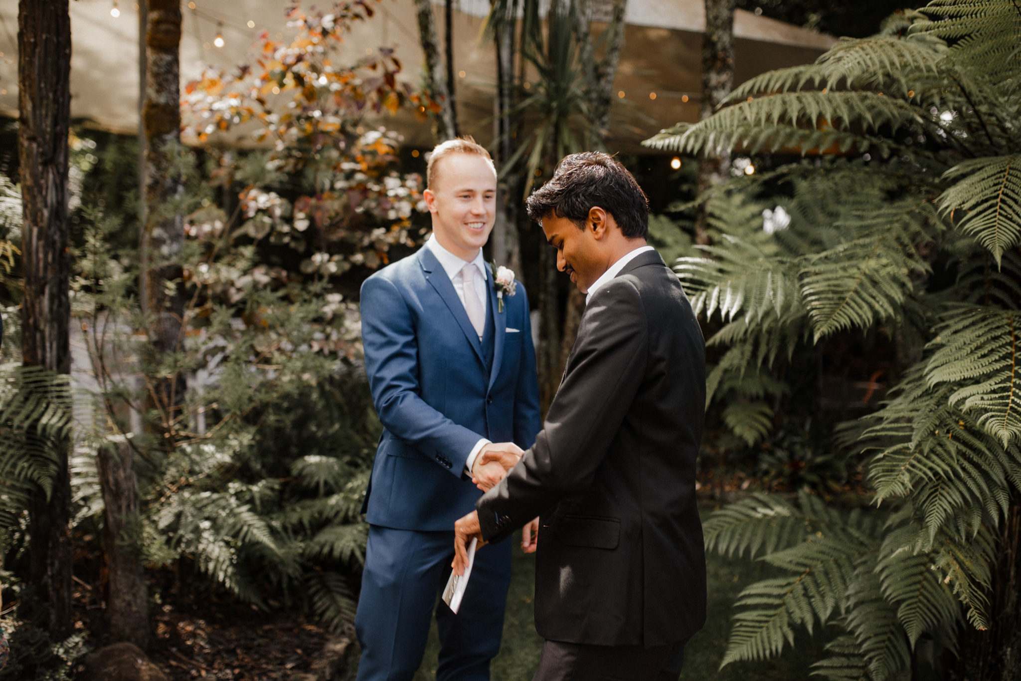 groom welcoming guests to tui hills