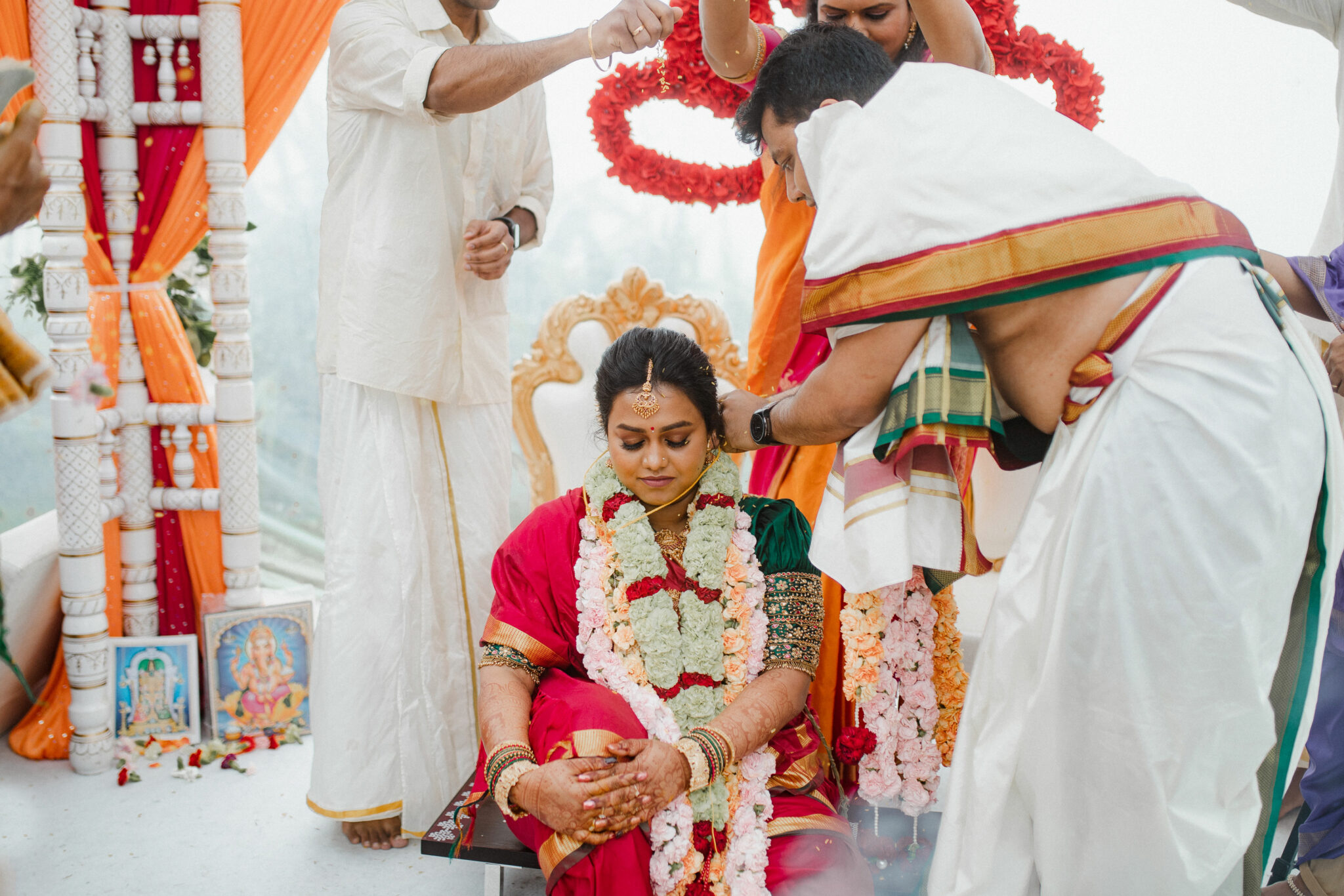 bride putting on the thali